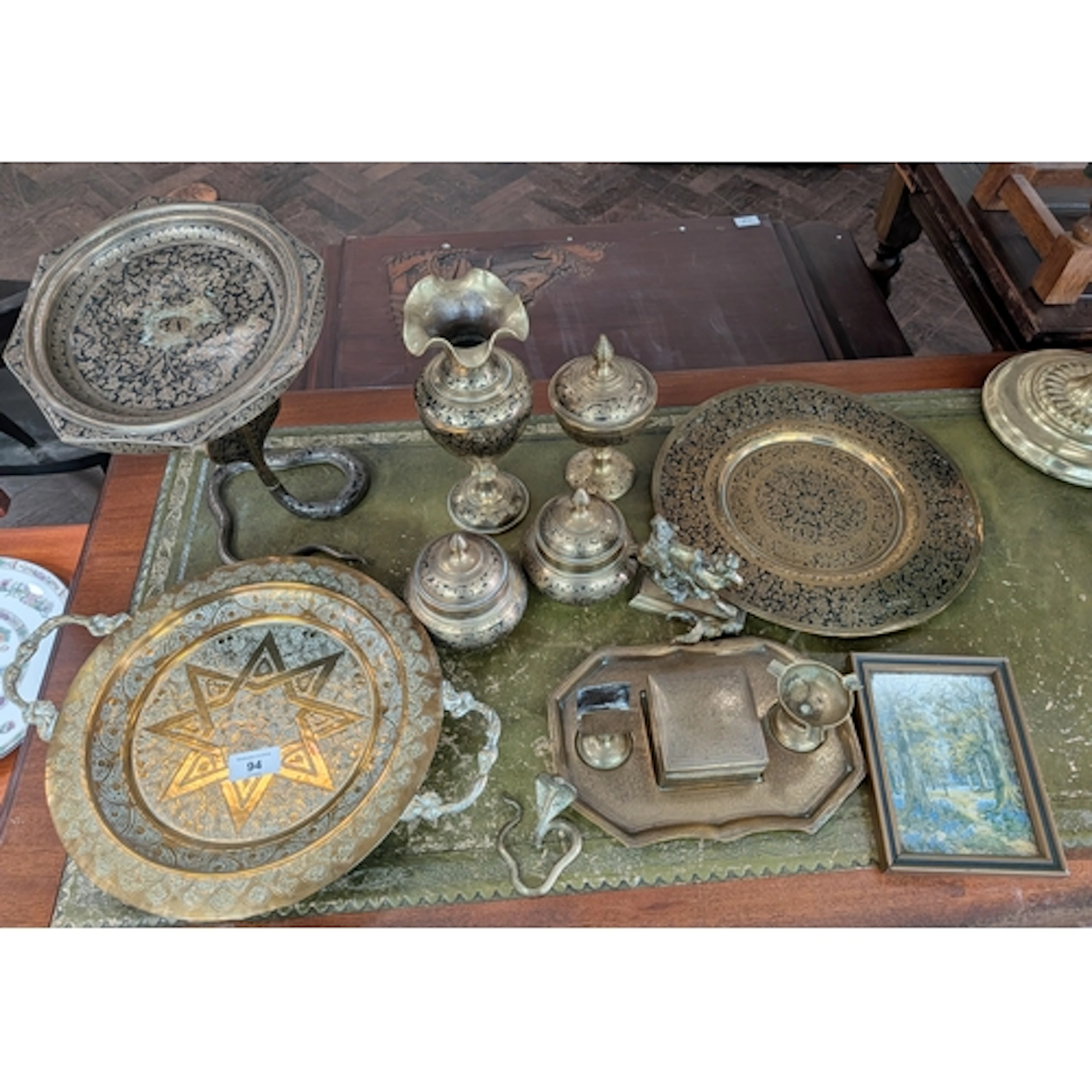 A collection of assorted Benares and other brass ornaments e...