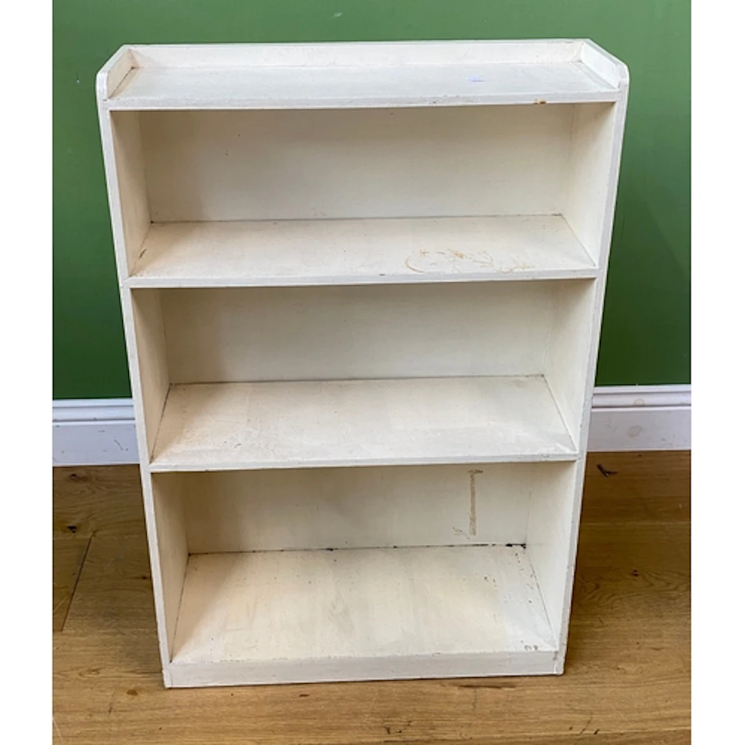A small white painted bookcase, 61cmW