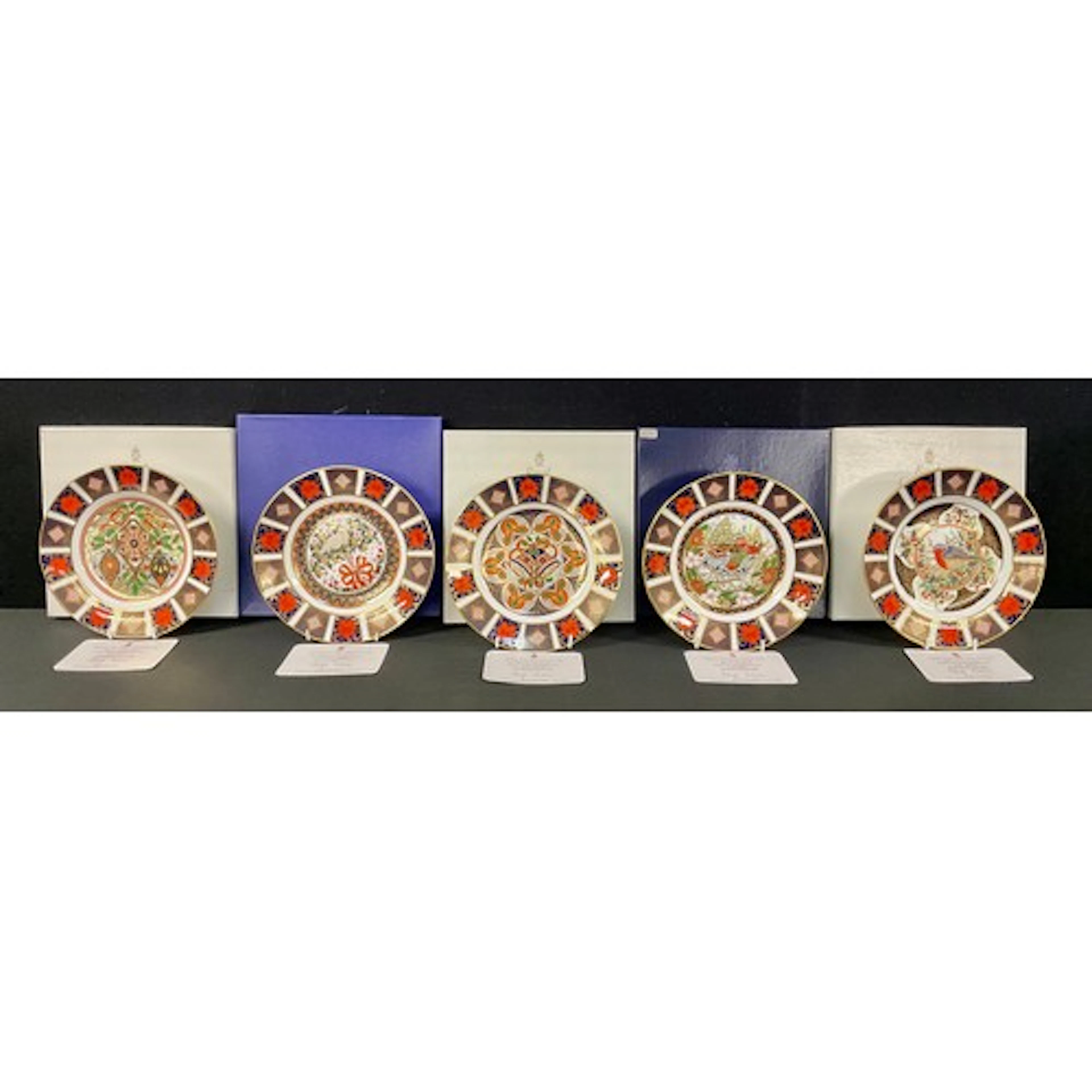 Five Royal Crown Derby 1128 limited edition Christmas plates...