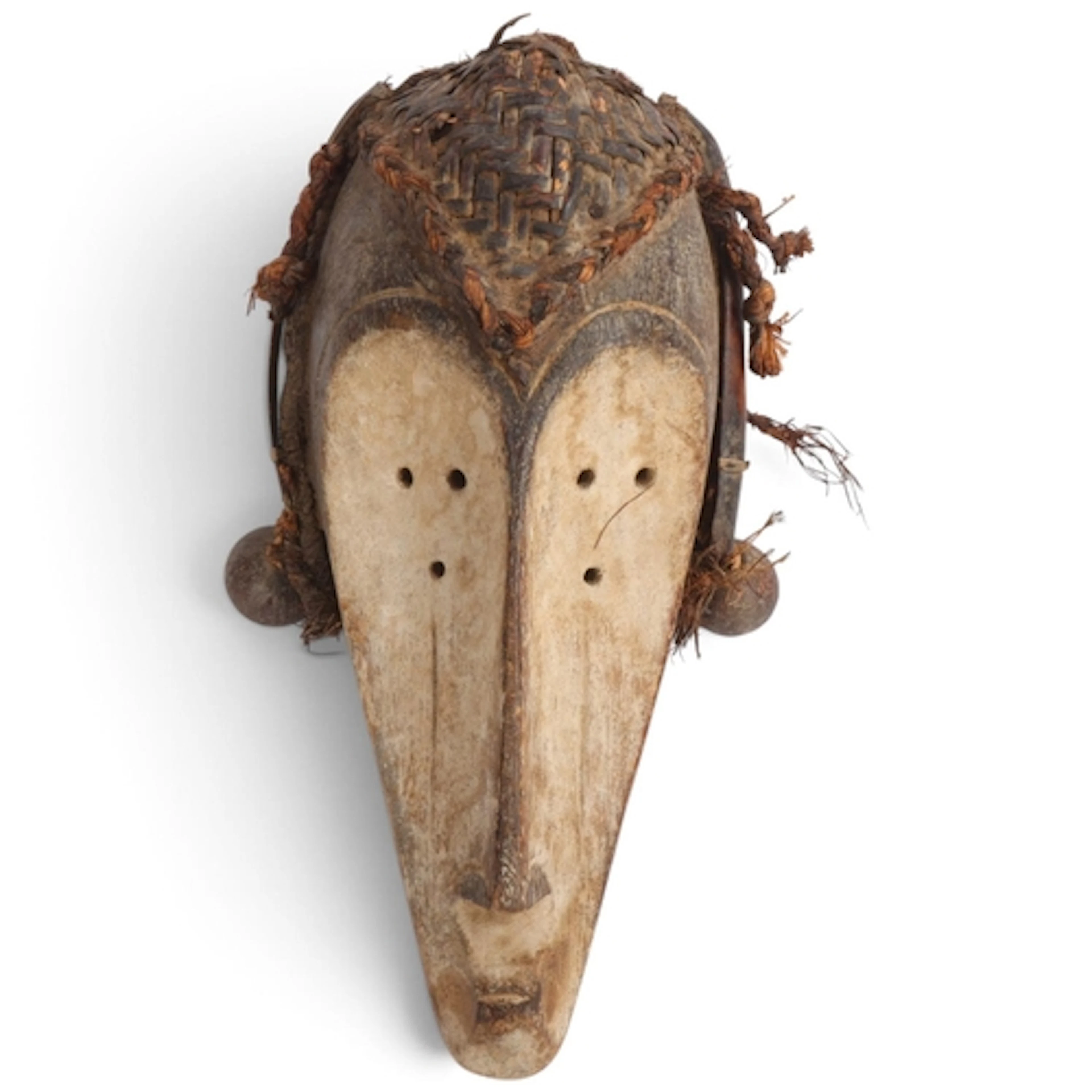 A Dan Tribal mask, Ivory Coast, carved and painted wood with...