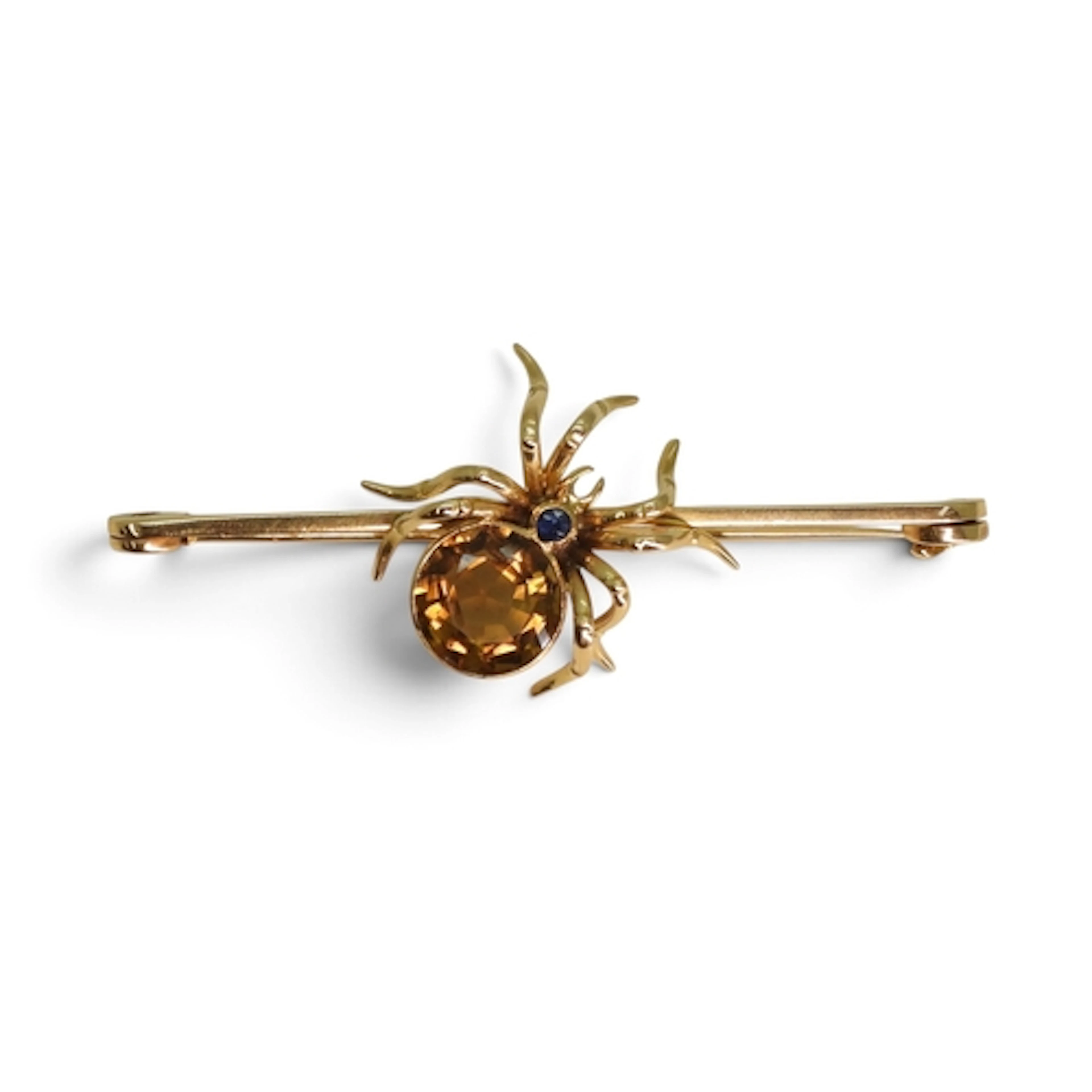 A GEMSTONE SET SPIDER BROOCH made in 15ct gold and set with ...
