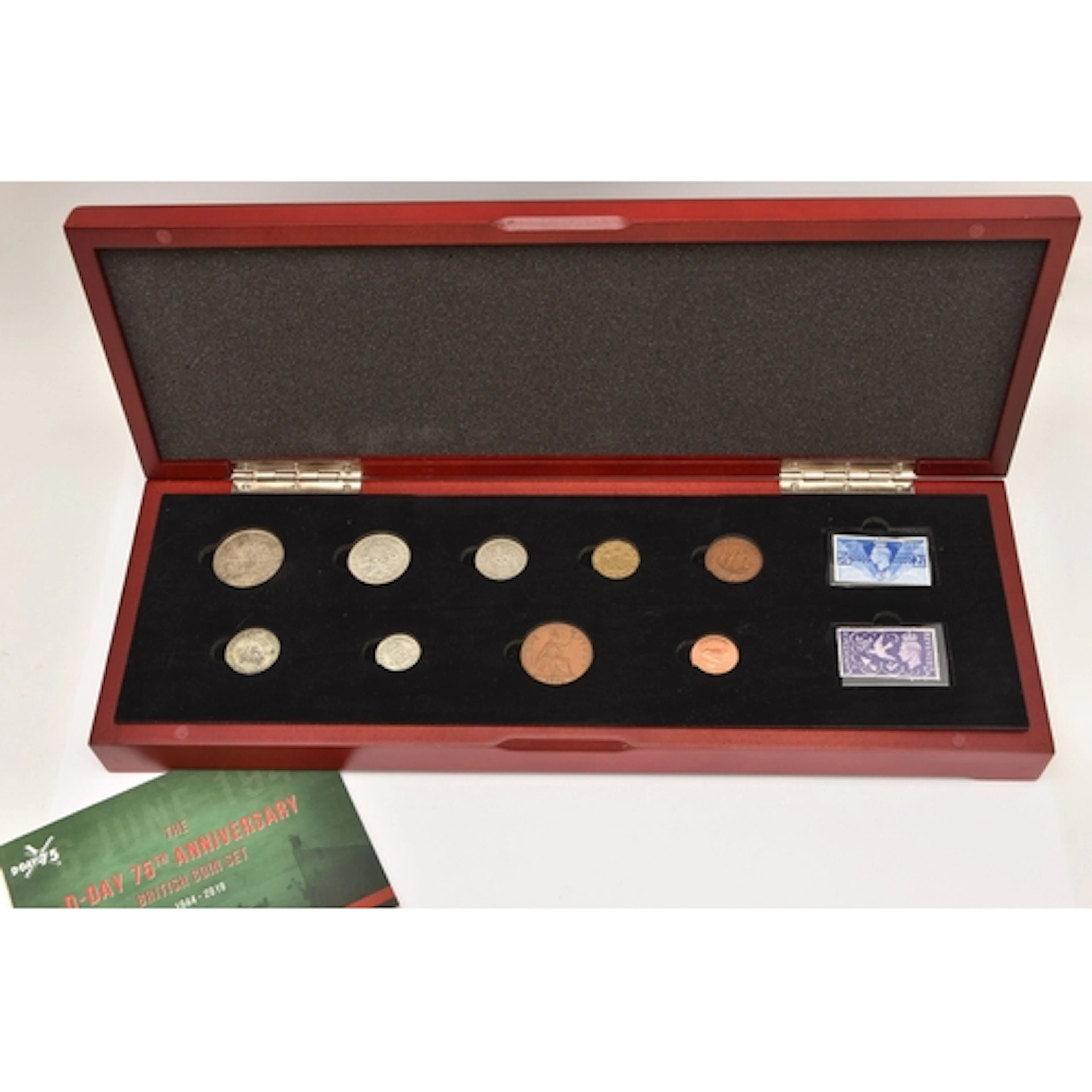 A Presentation Case containing 9 coins and 2 stamps from 194...