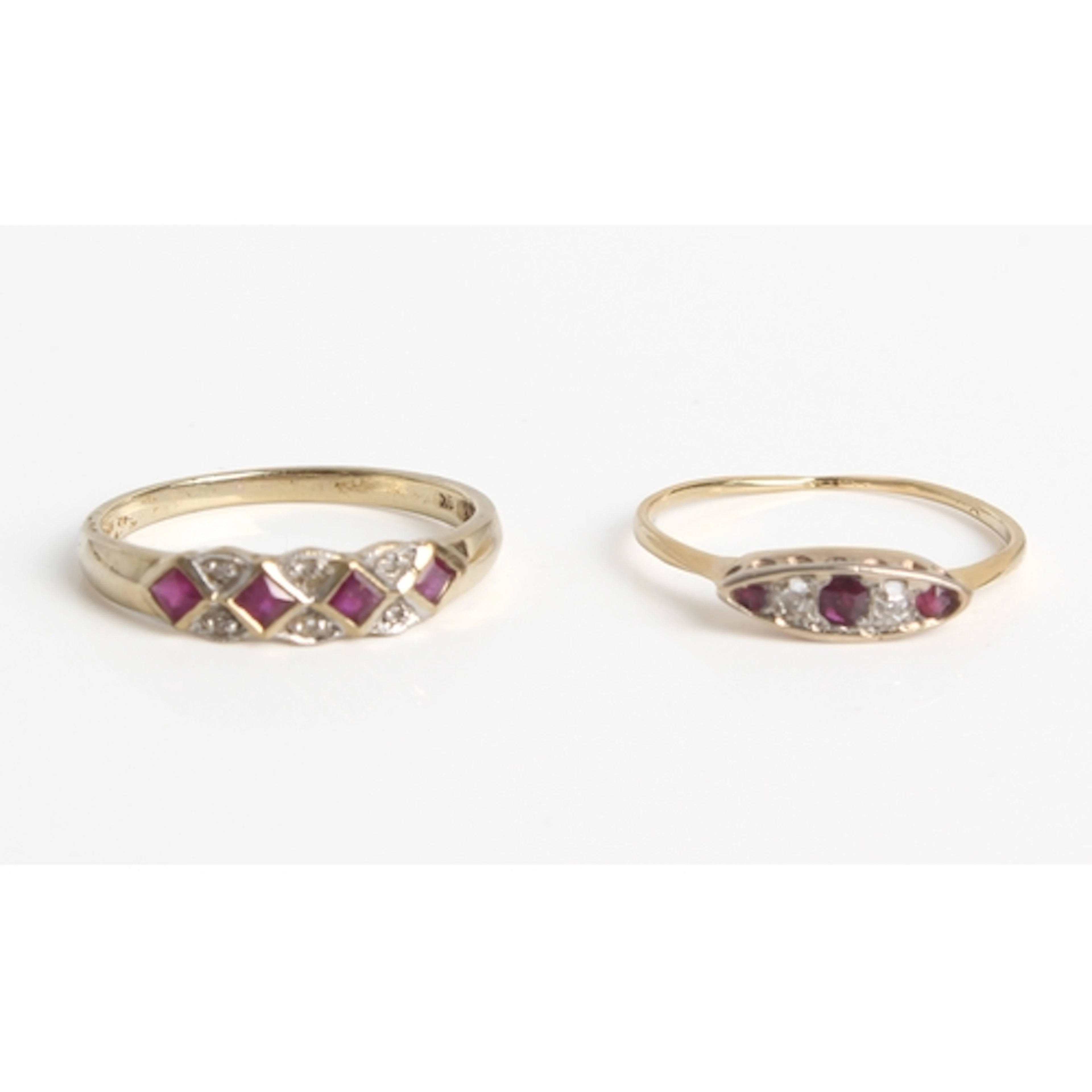 Two yellow gold and gemstone rings - comprising a mid-centur...