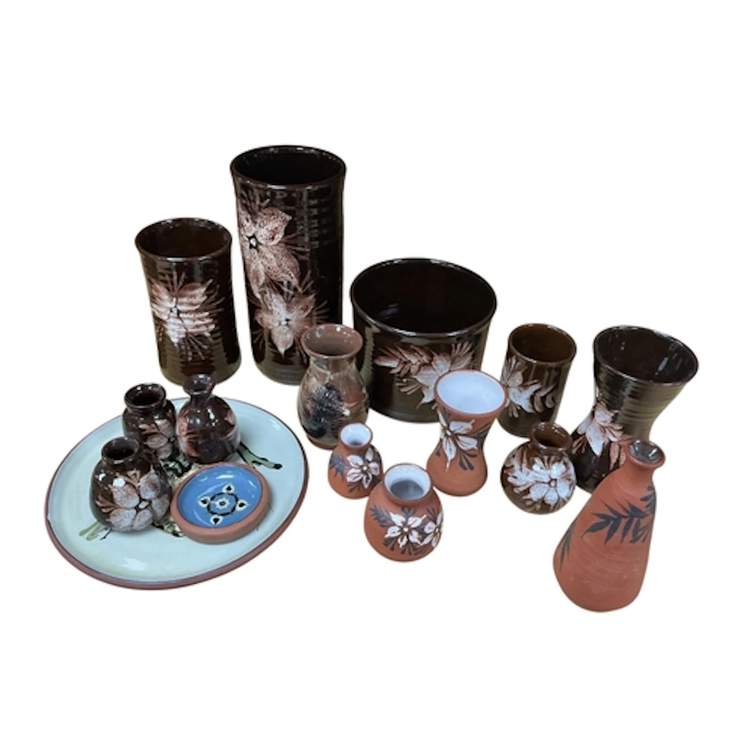 A collection of sixteen pieces of Tenby pottery of mostly mi...