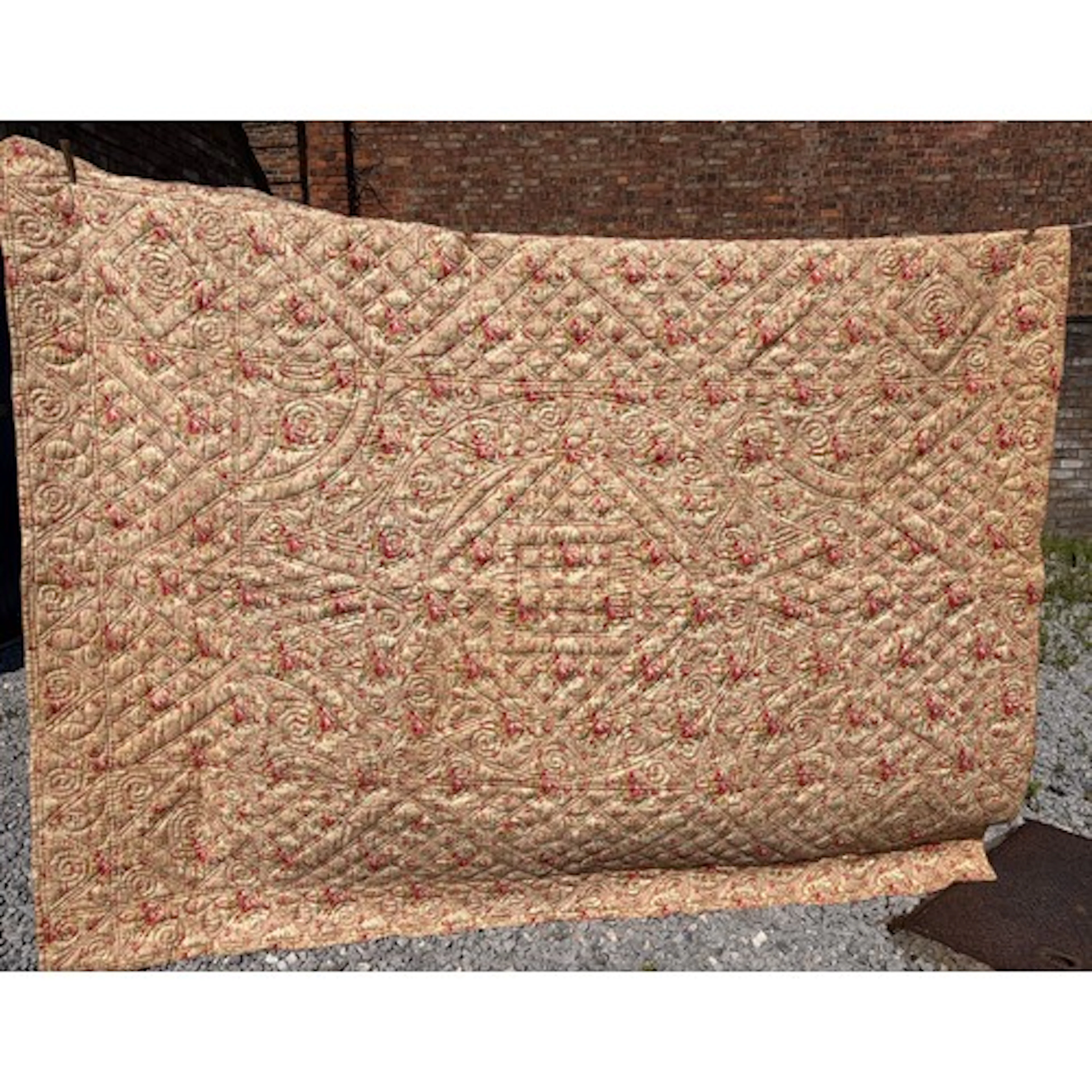 Vintage hand-quilted bedspread, pink floral design with crea...