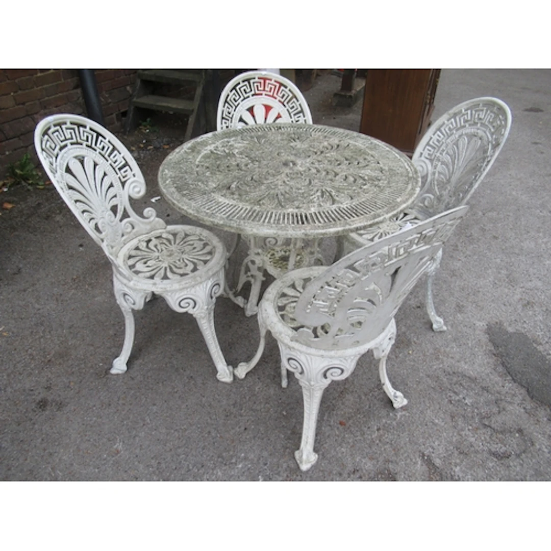 20th Century white painted cast alloy garden table, with set...