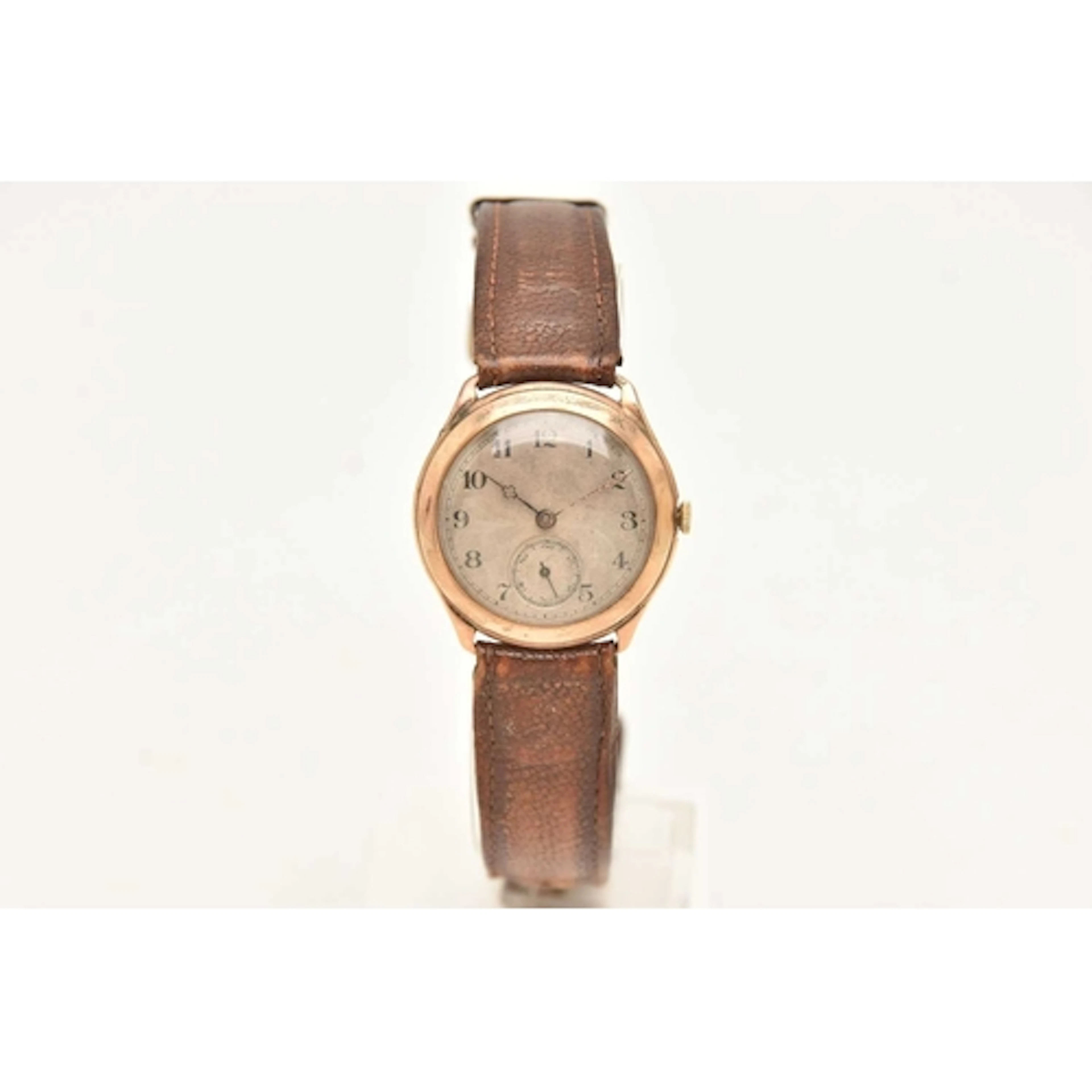 A 9CT GOLD WRISTWATCH, hand wound movement, round discoloure...