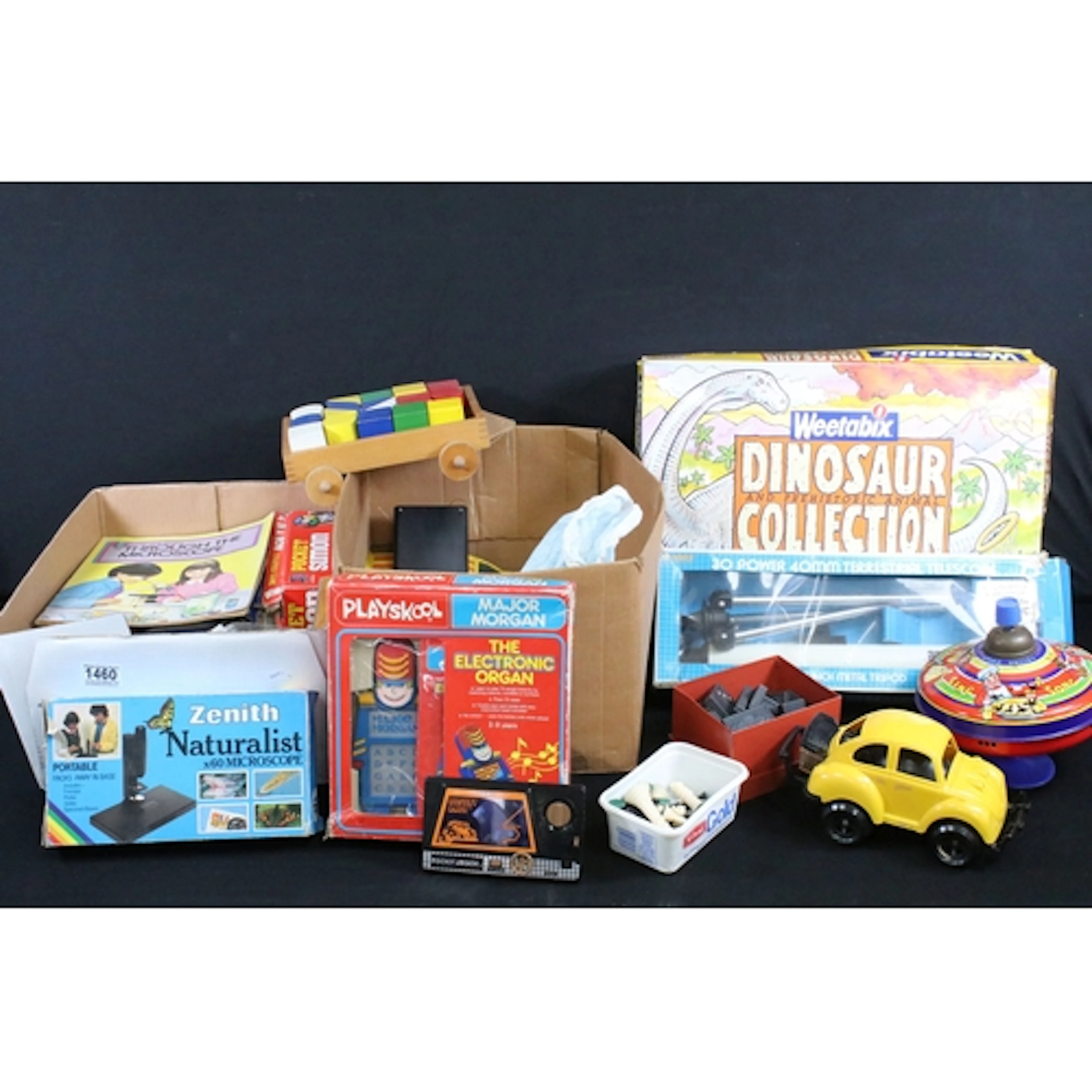 Group of toys and games to include boxed Weetabix Dinosaur C...