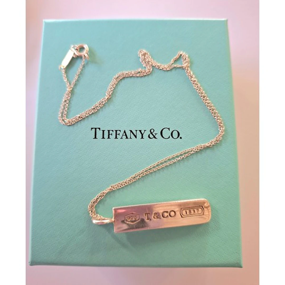 Tiffany & Co- A silver 1837 bar pendant necklace, 7g, togeth...