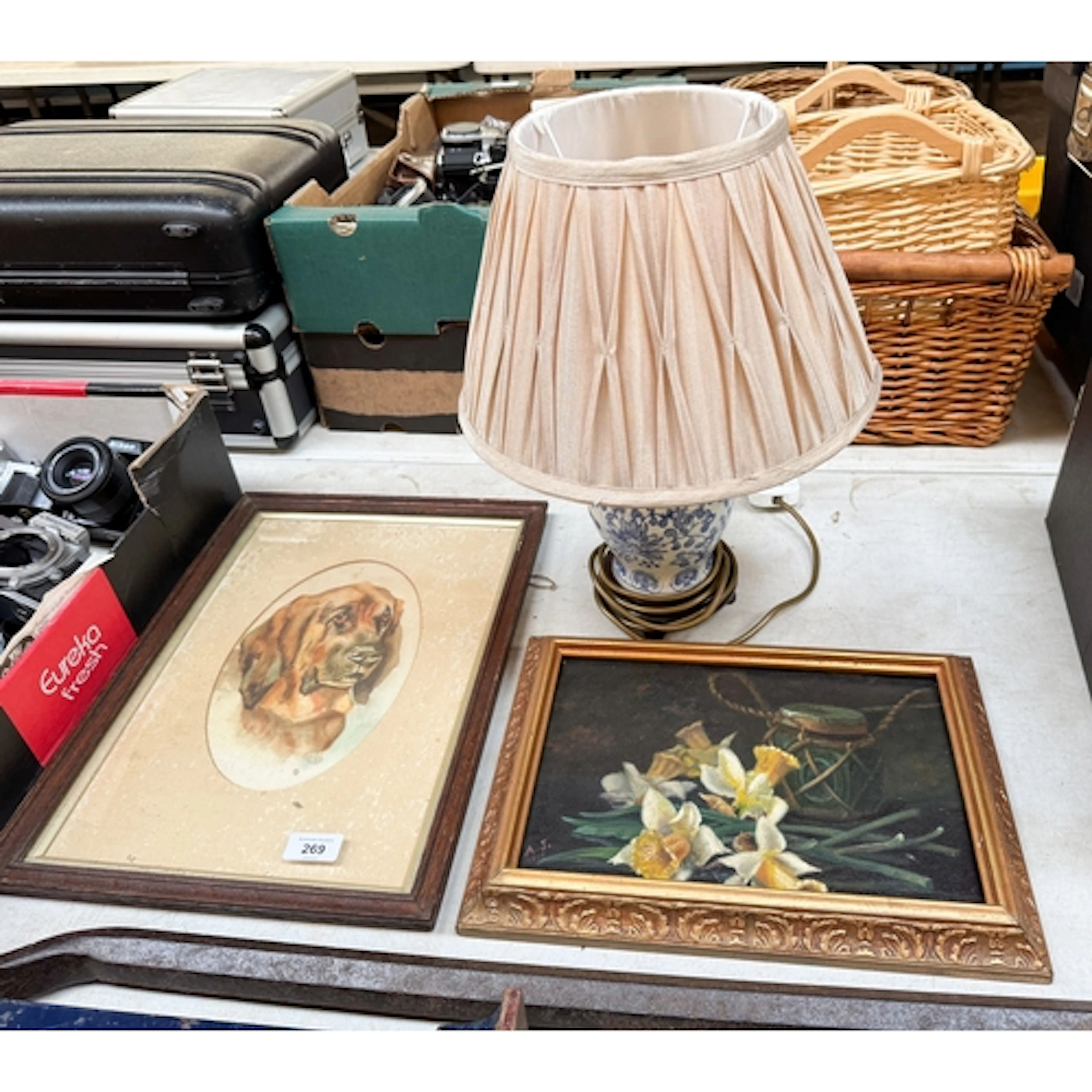 A small blue and white table lamp together with a gilt frame...