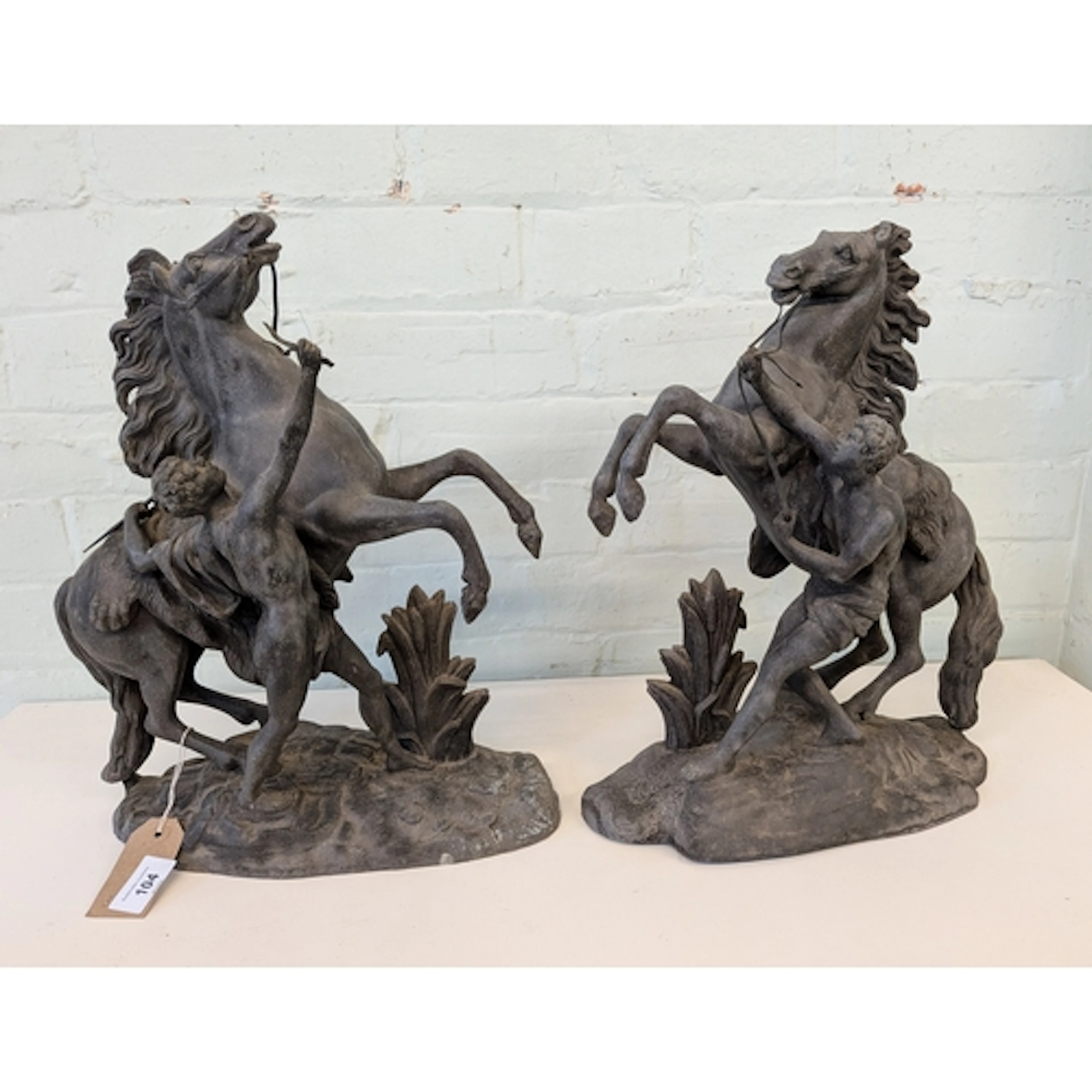 A pair of Victorian Spelter Marley horse ornaments
