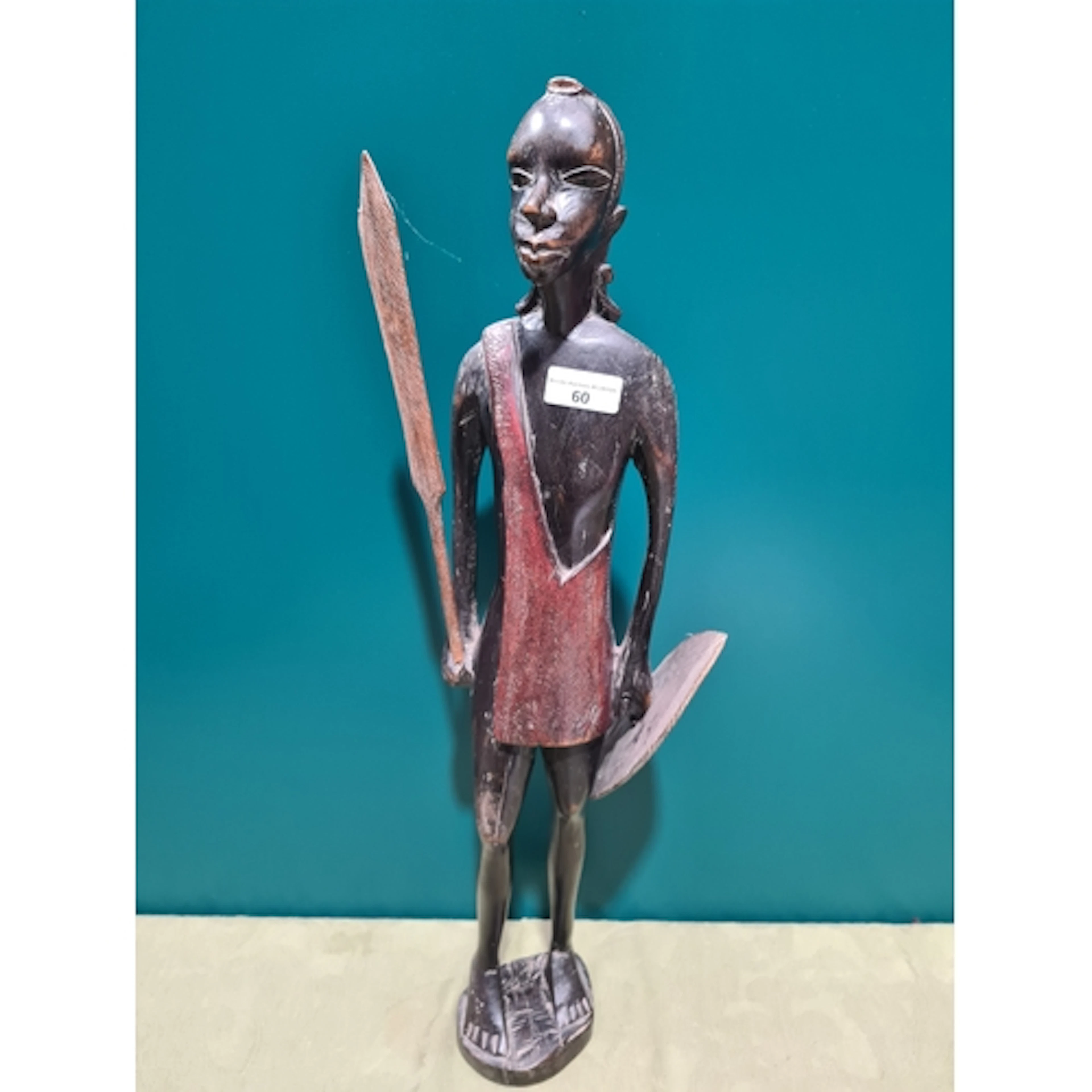 An African carved wooden Figure with spear and shield, 24in
