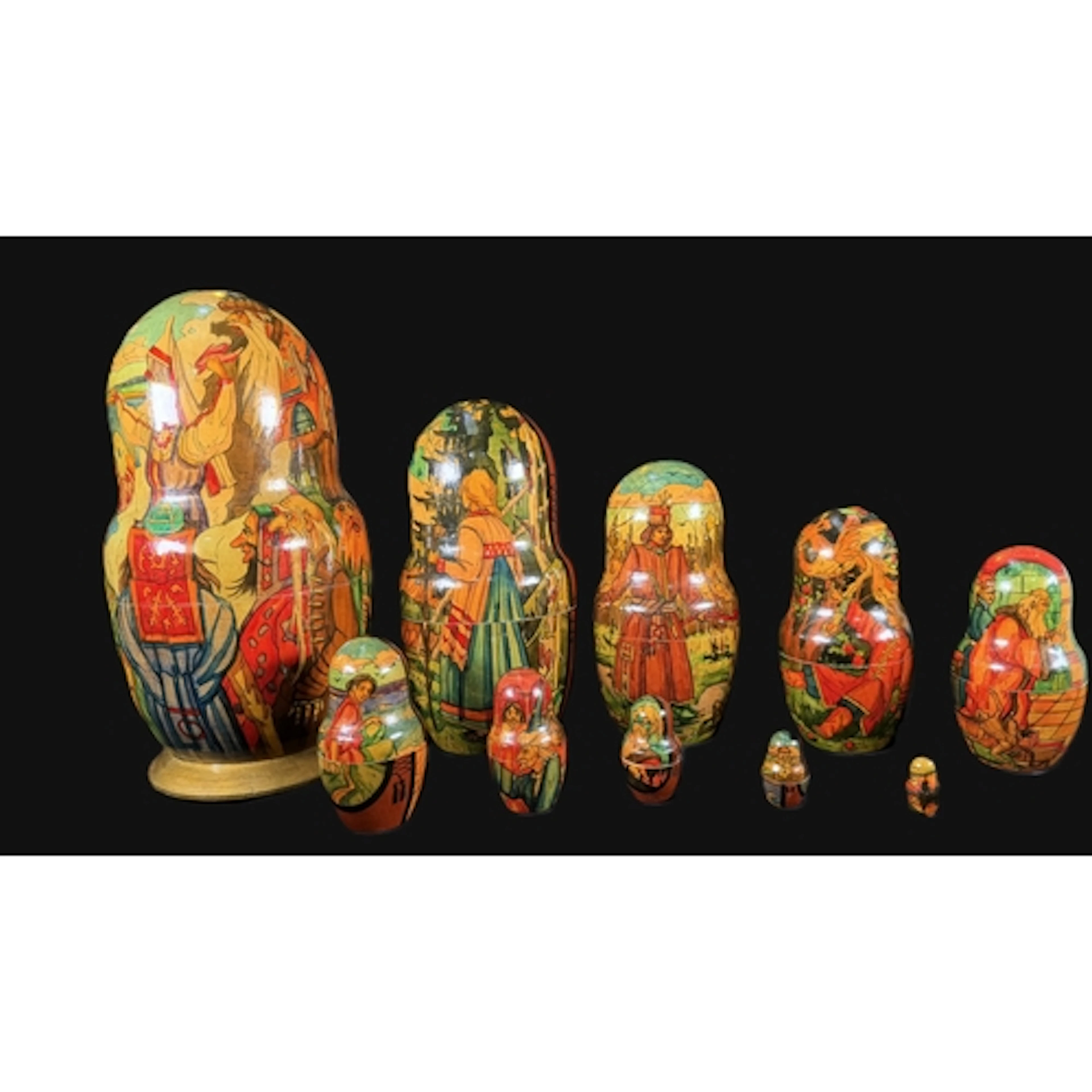 A Russian Matryoshka set of 10 wooden nest of dolls each pai...