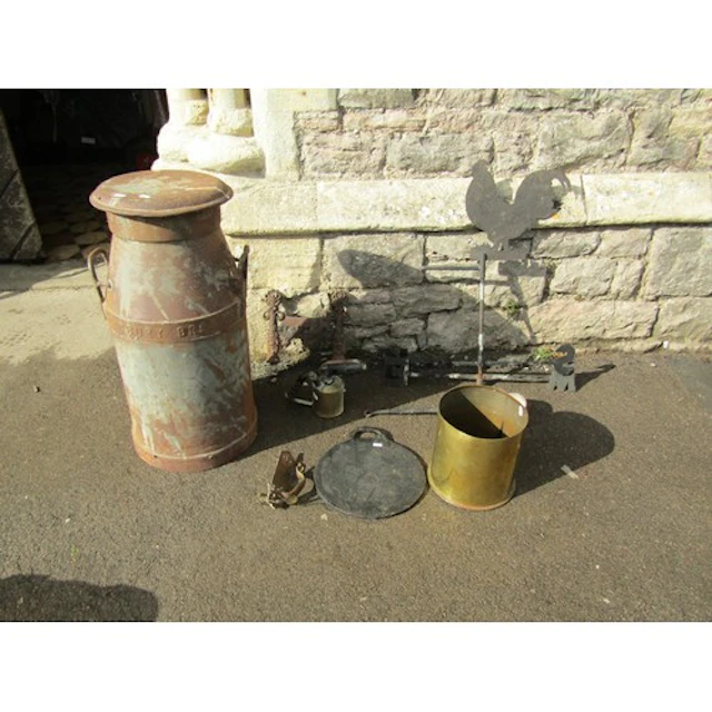 Vintage ironware, a Cadbury Bros milk churn of traditional f...