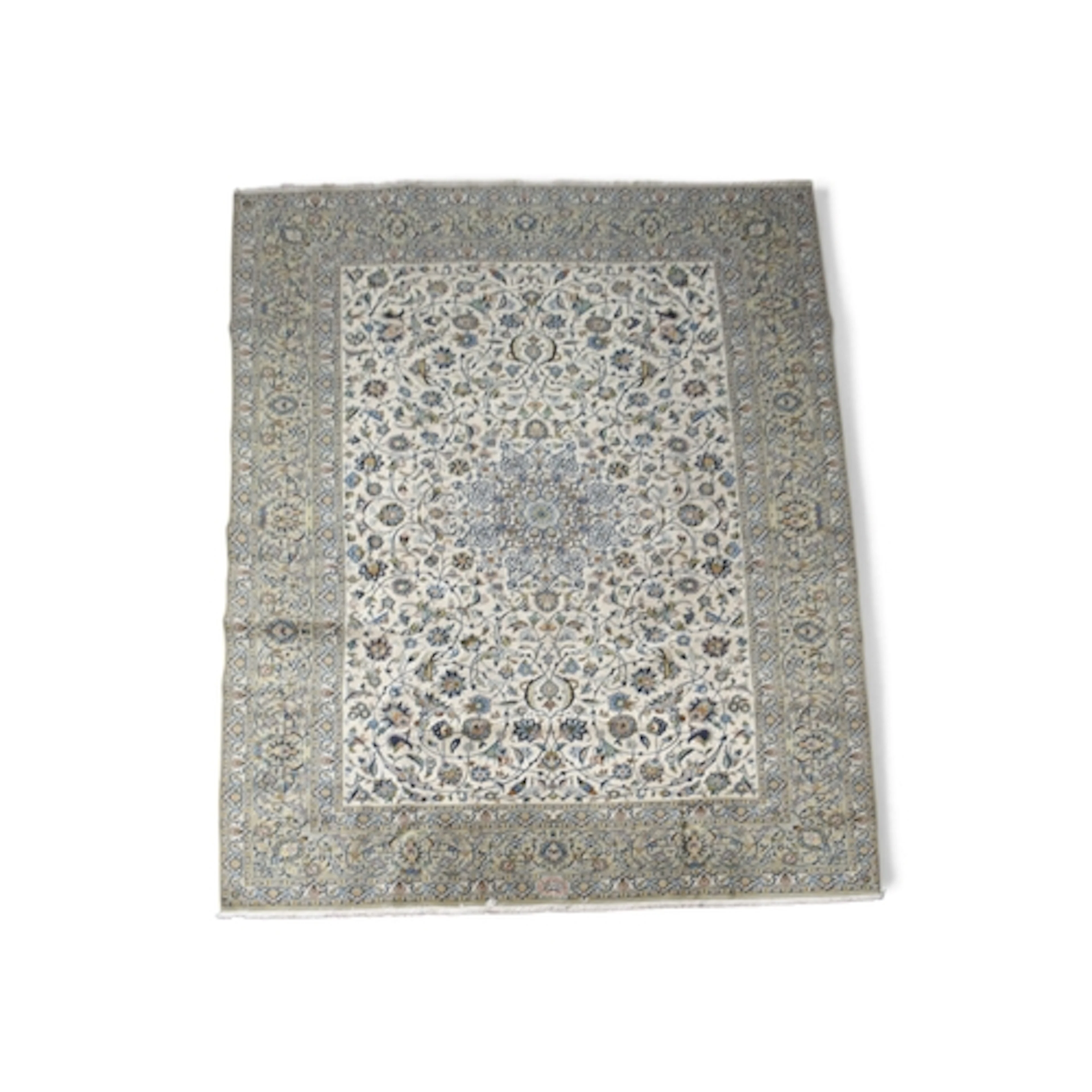 A CREAM GROUND FINE PILE KASHAN RUG with multicoloured sunbu...