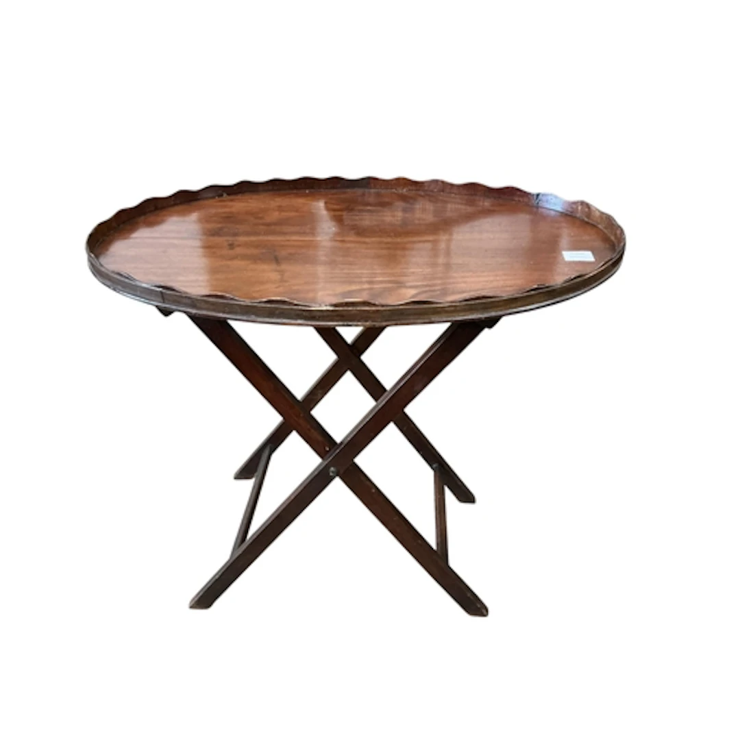 A George III large mahogany oval tea tray on later folding s...
