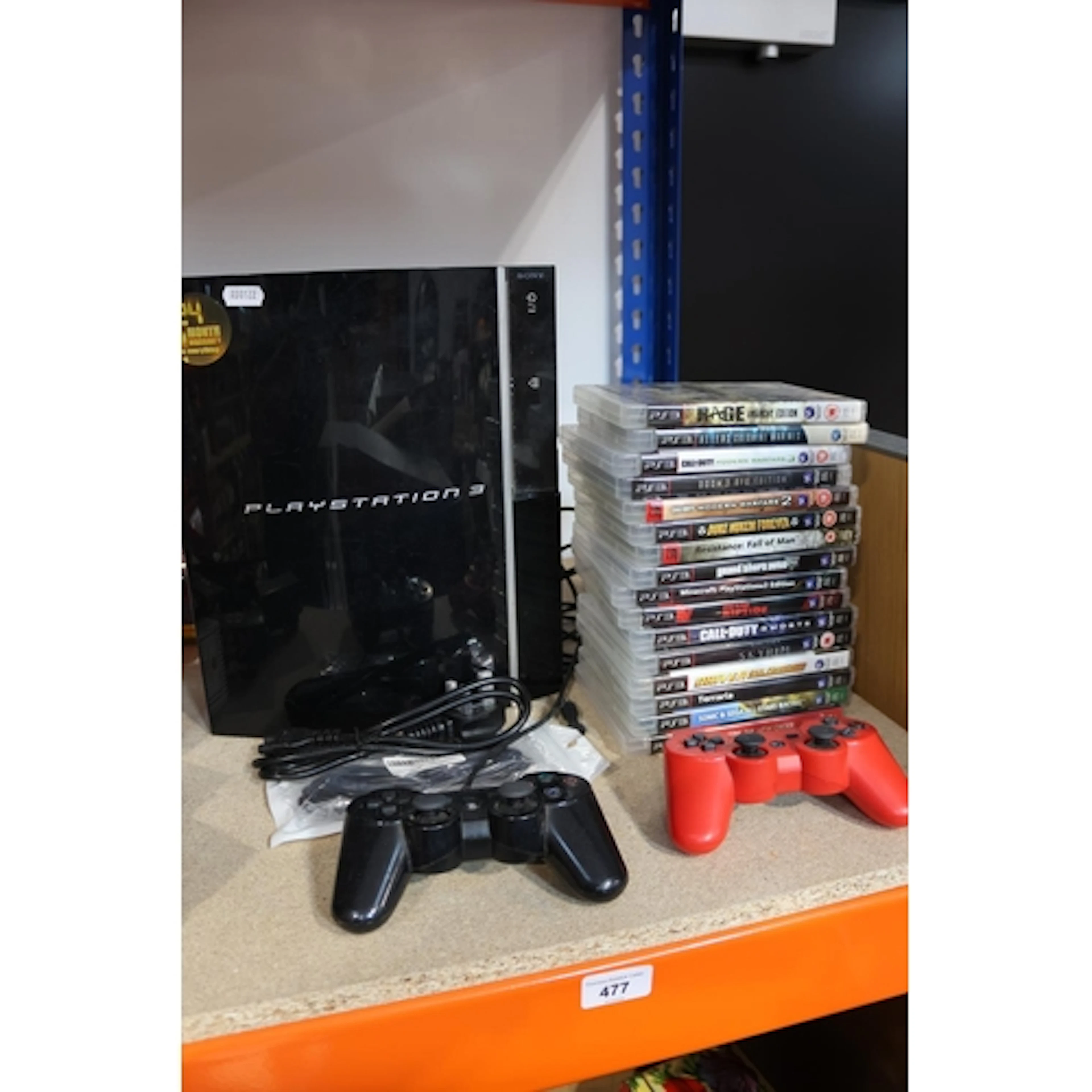 Playstation 3 games console, two controllers and a quantity ...