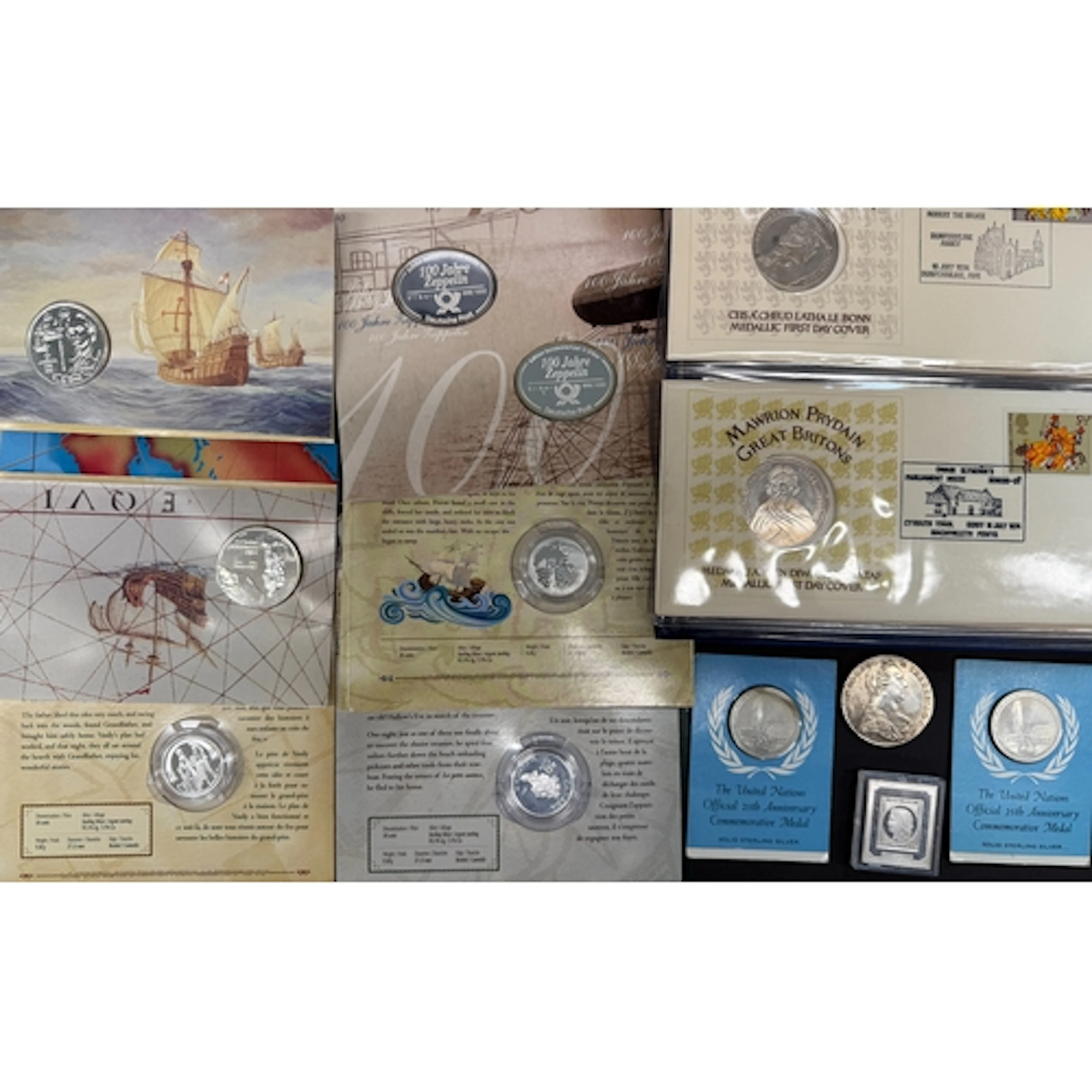 A group of 15 world silver coins, medallions and ingots, com...