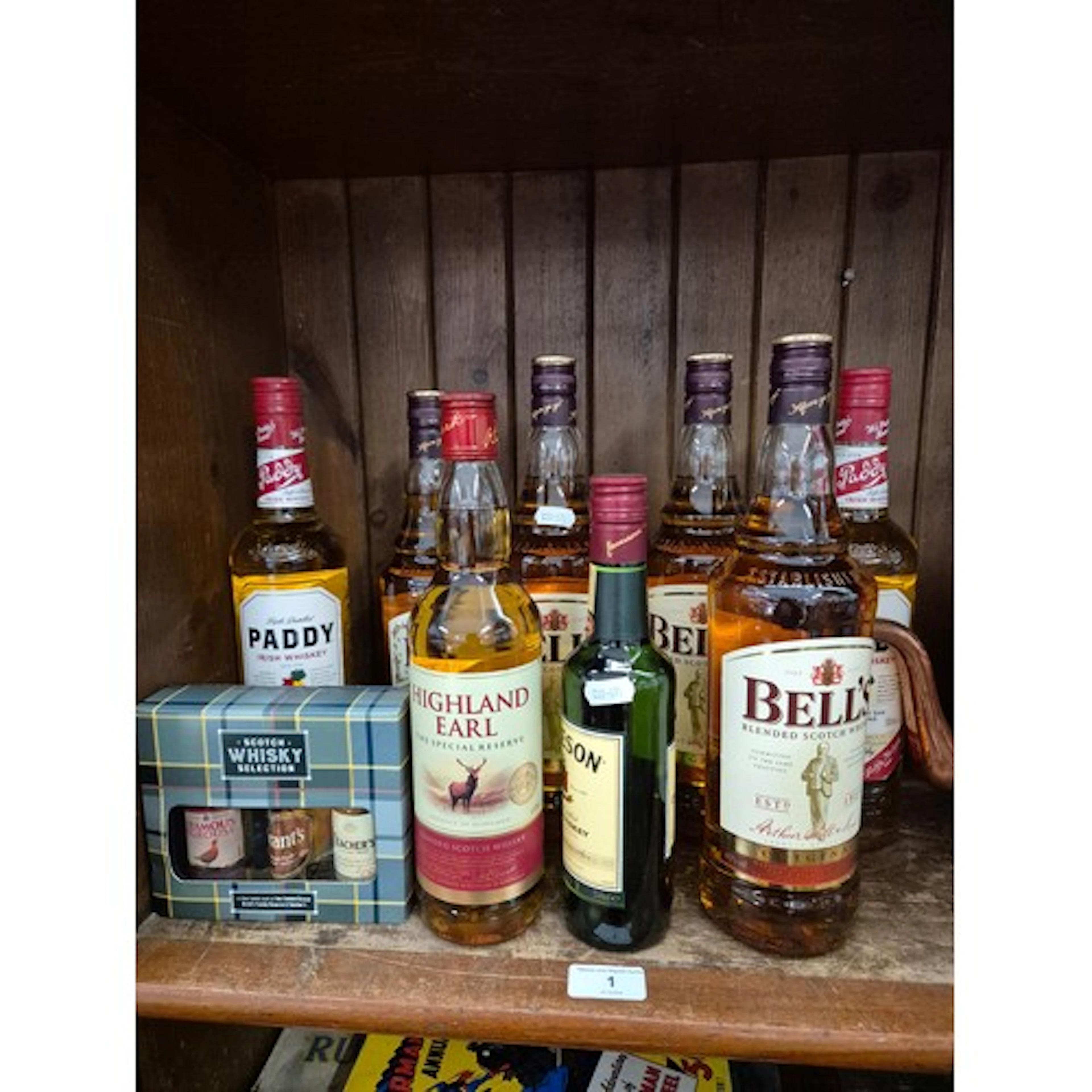 A group of assorted whiskies comprising of 4 x Bell's, 2 x ...