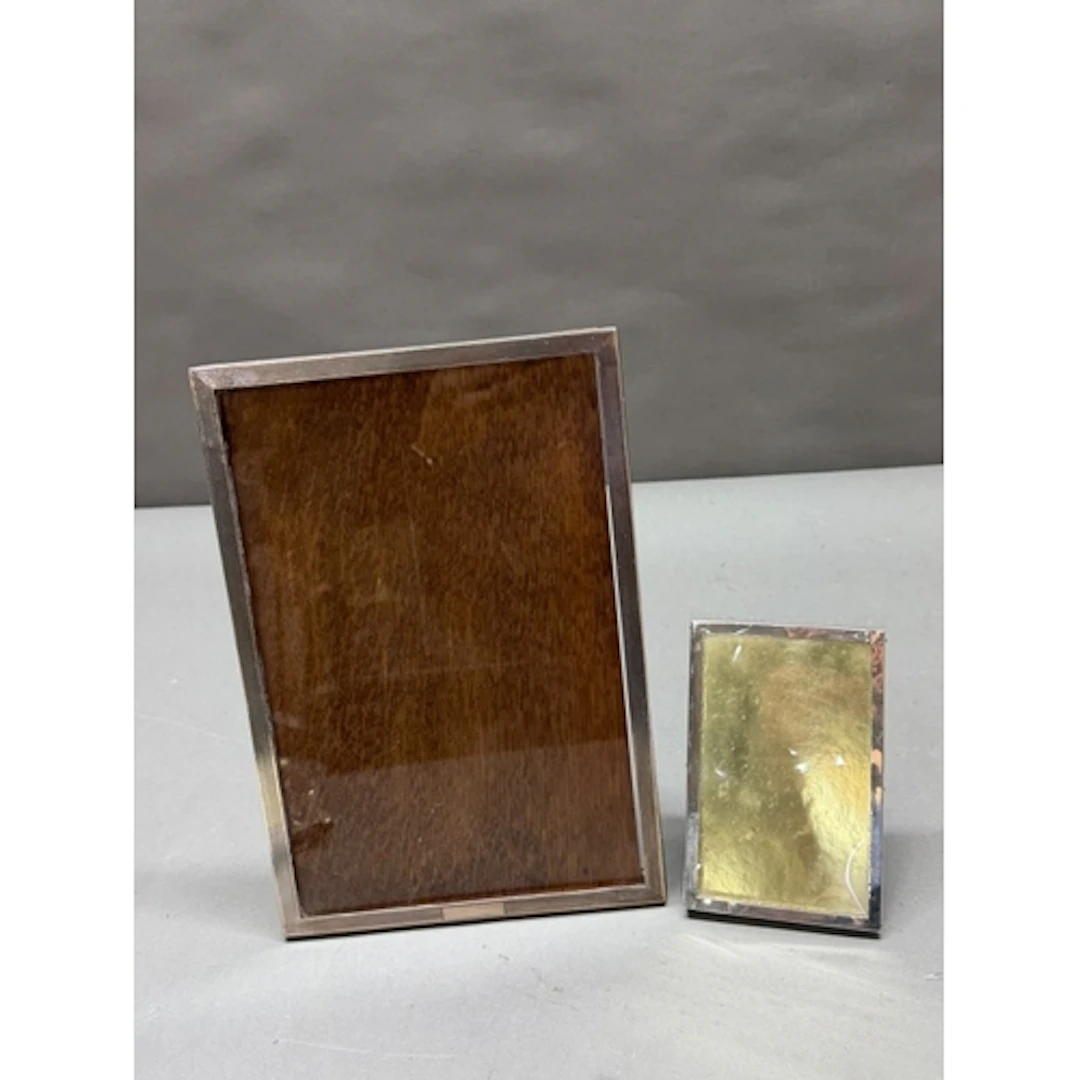 Two hallmarked silver picture frames with easel backs, appro...