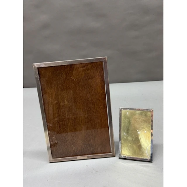 Two hallmarked silver picture frames with easel backs, appro...