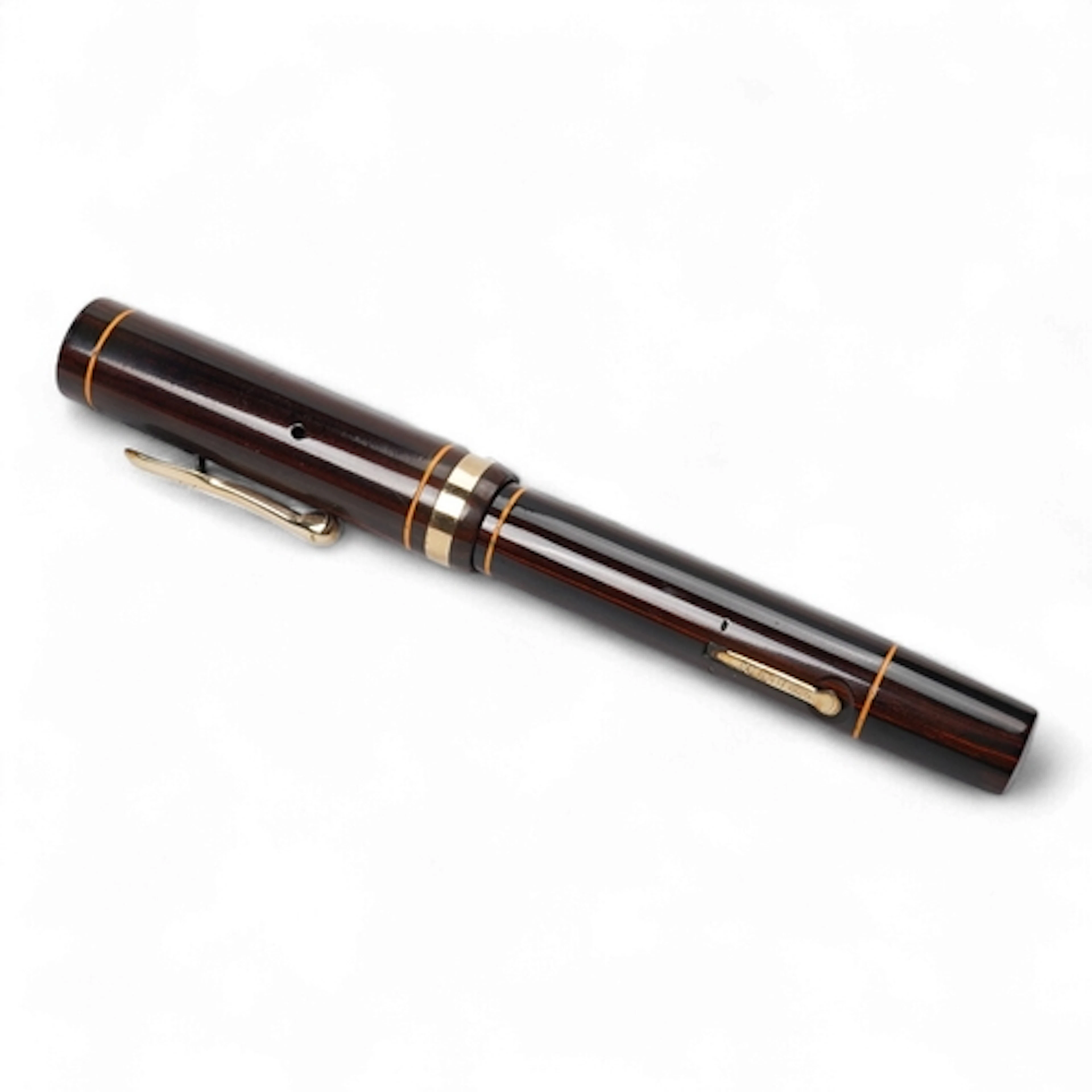 A Conklin Endura woodgrain lever filler fountain pen in near...