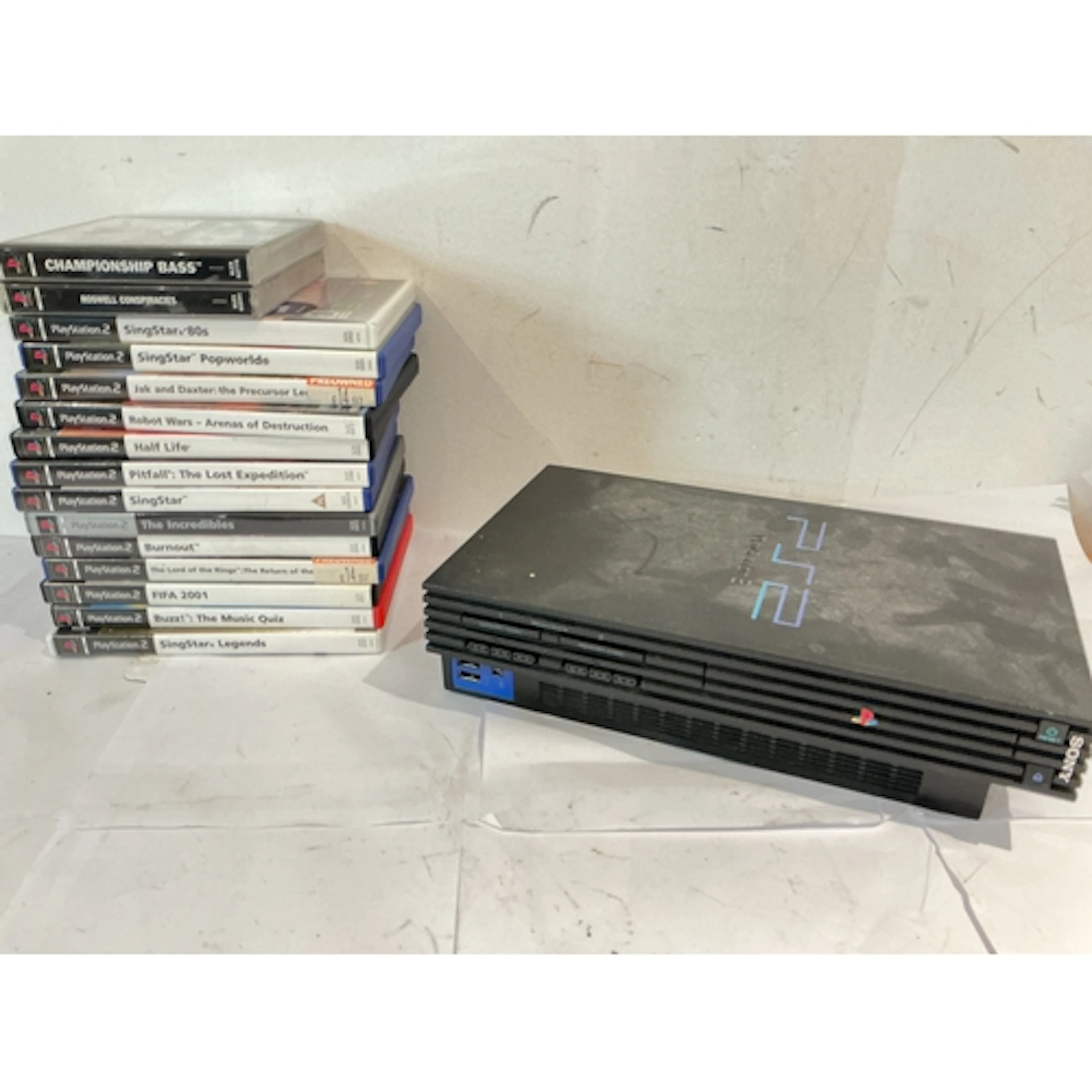 A Box Containing A Sony PlayStation 2, Games And Accessories...