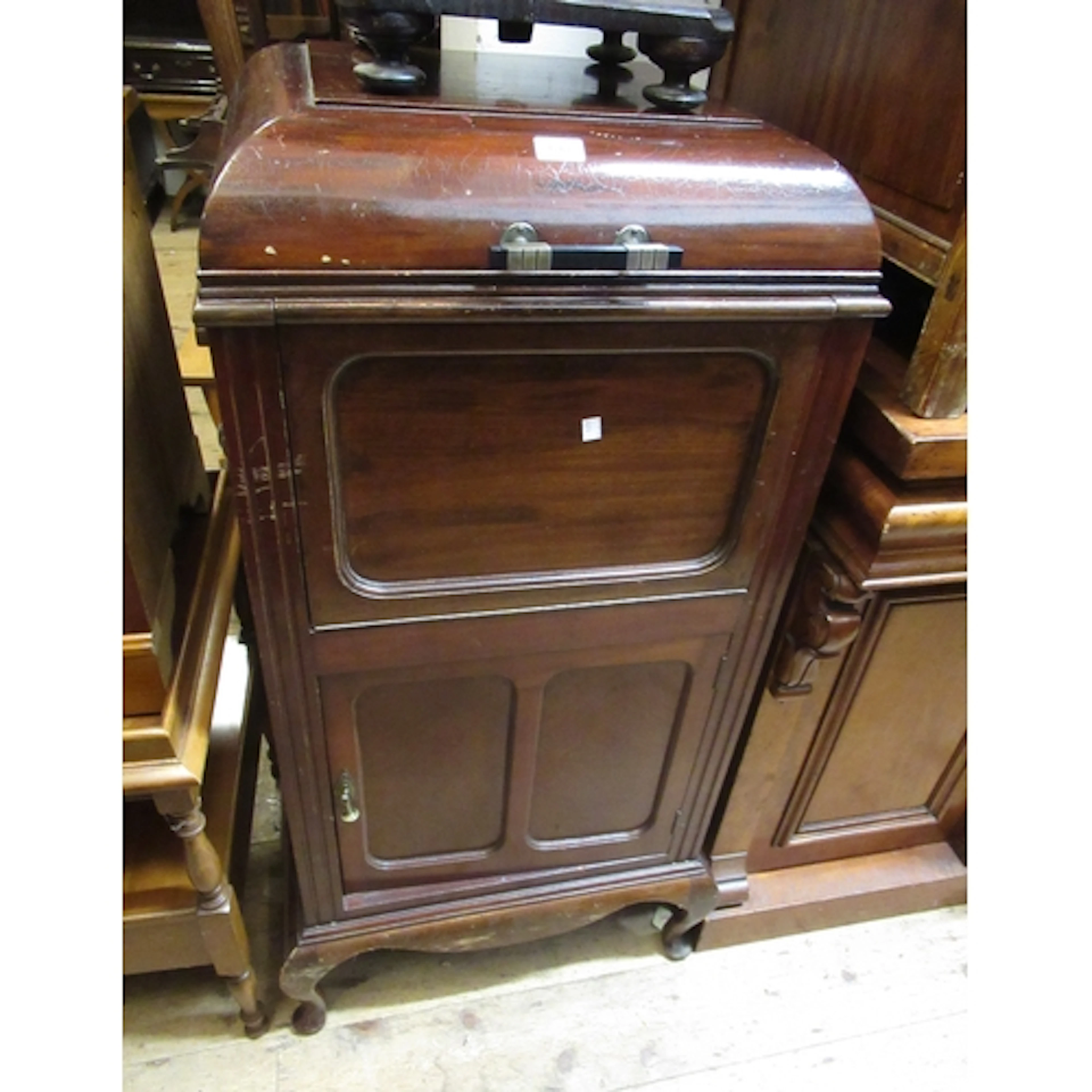 Art Deco mahogany drinks cabinet, the hinged cover above fal...