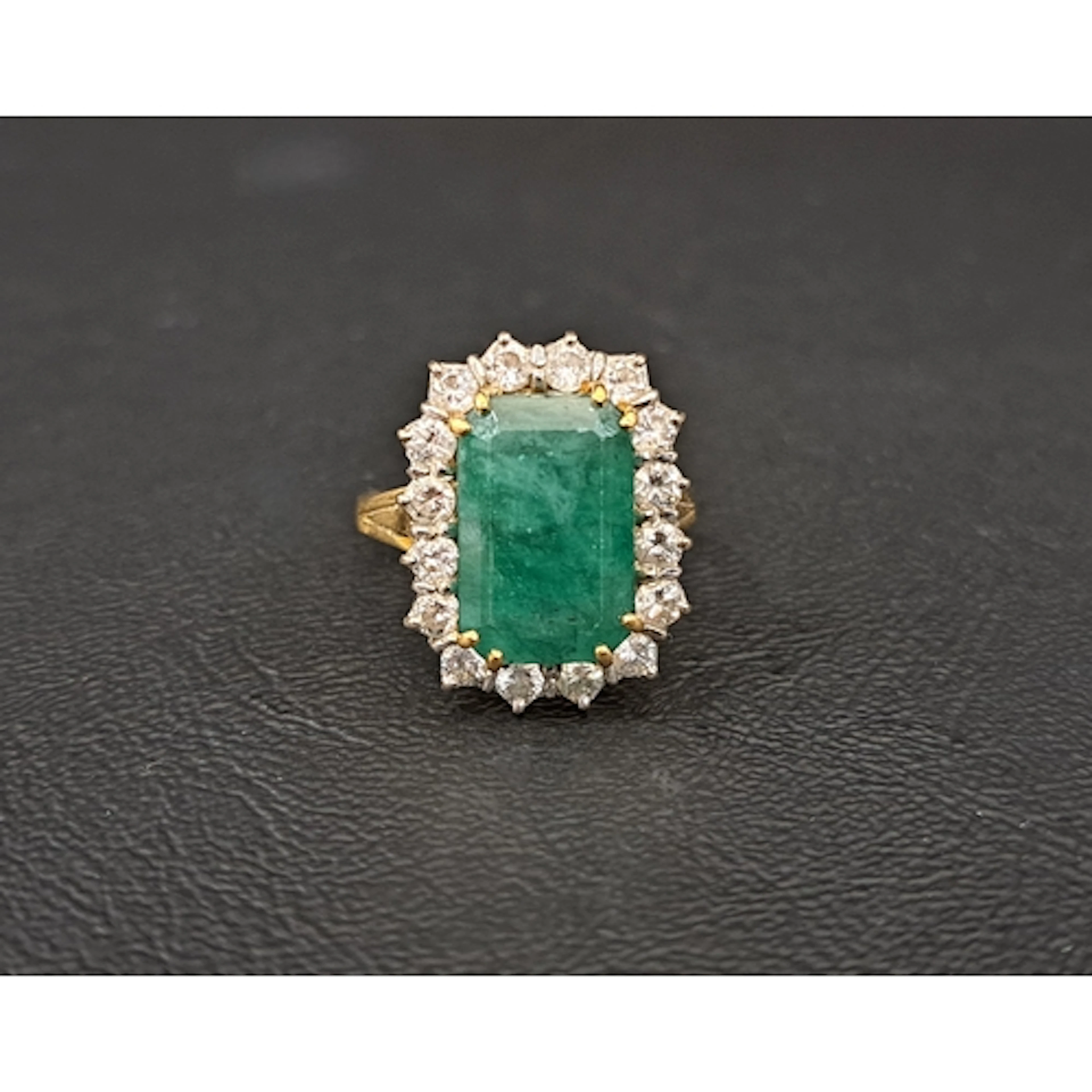 IMPRESSIVE EMERALD AND DIAMOND CLUSTER RING the rectangular ...