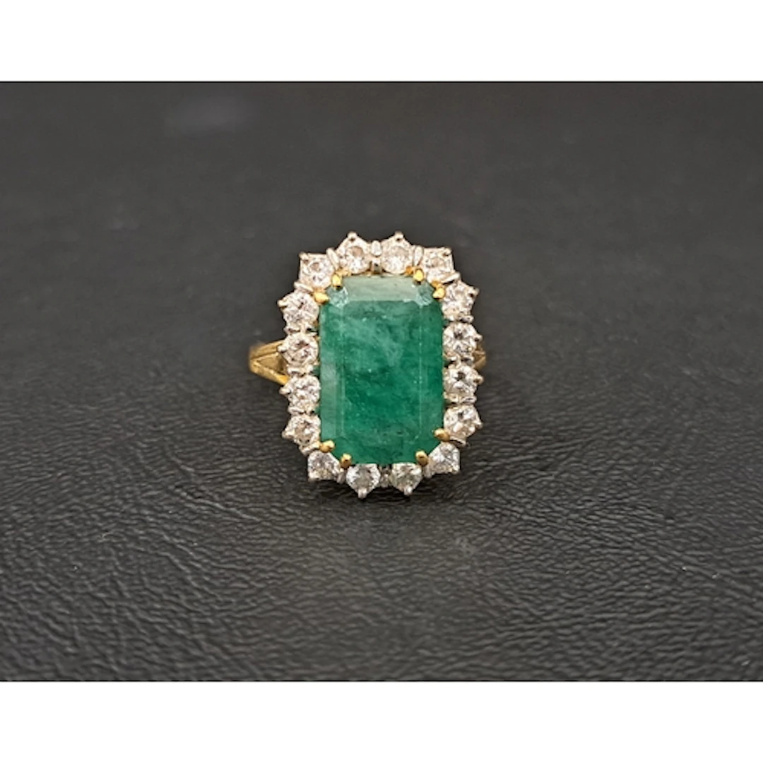 IMPRESSIVE EMERALD AND DIAMOND CLUSTER RING the rectangular ...