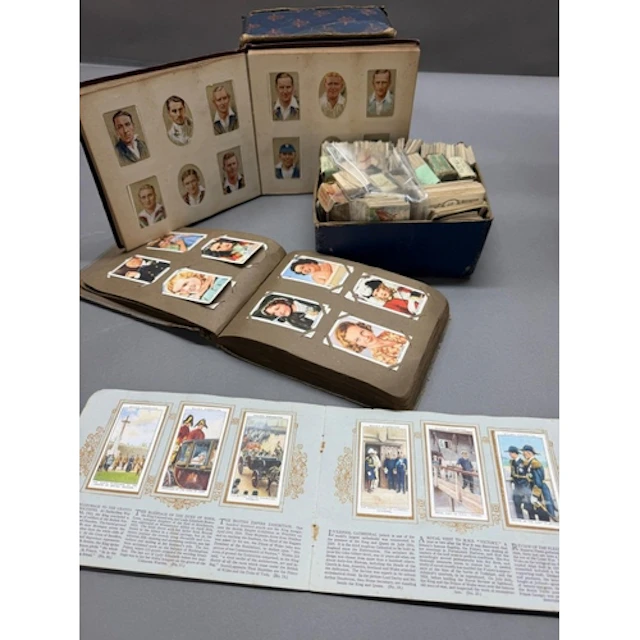 A selection of cigarette cards by a variety of makers and co...