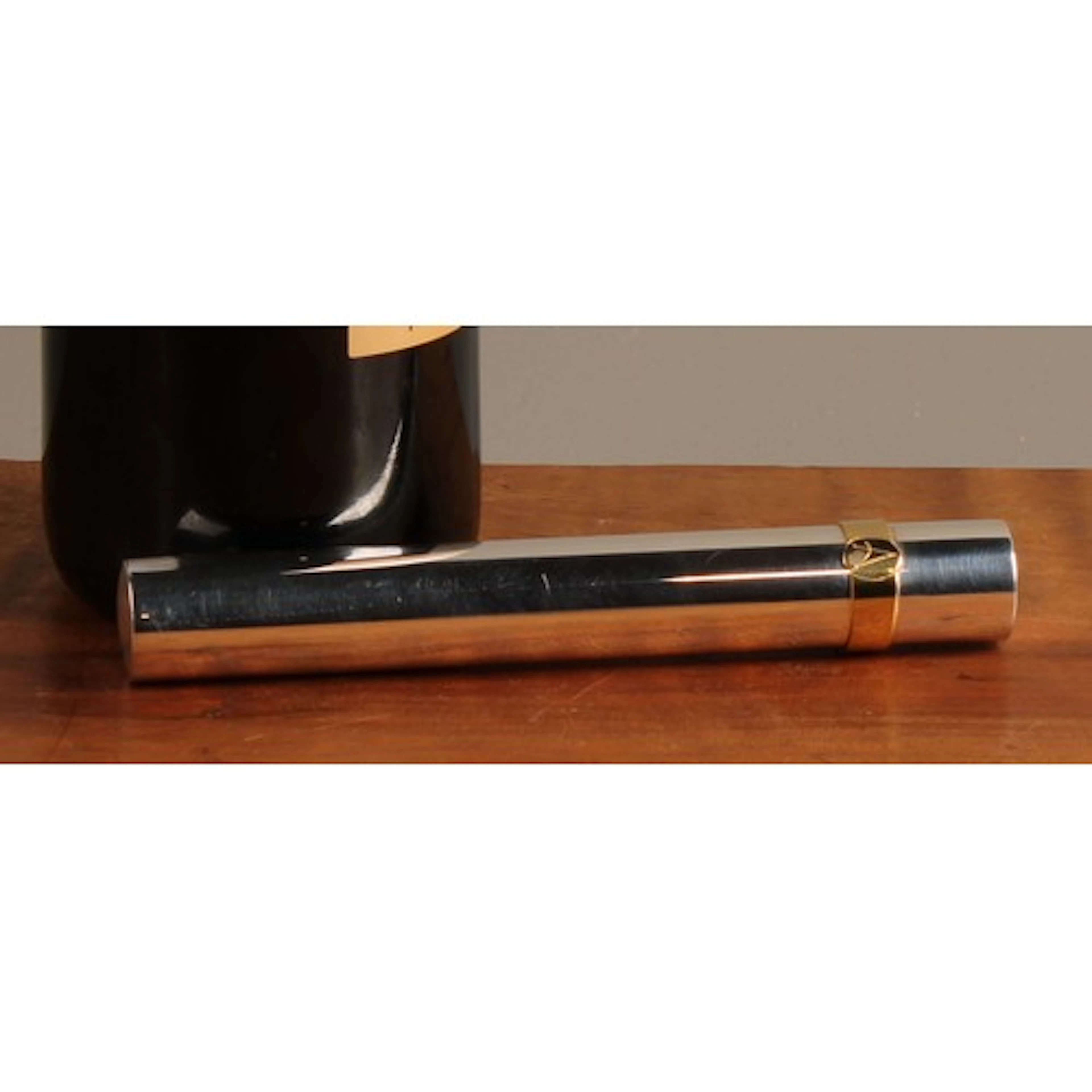 Asprey - an Elizabeth II silver and parcel-gilt cigar tube, ...