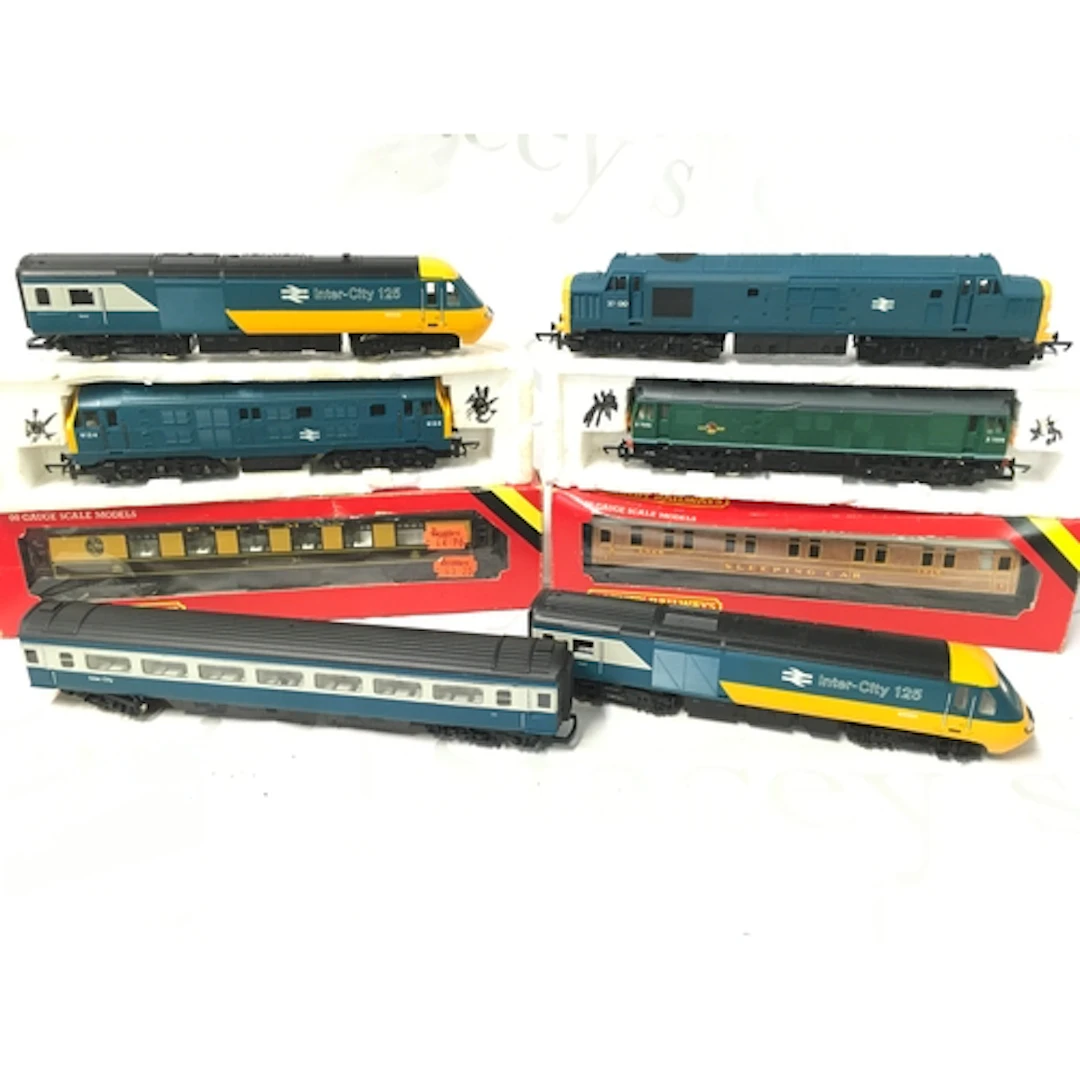 A Collection of 00 Gauge Locomotives, Coaches, Wagons And Tr...