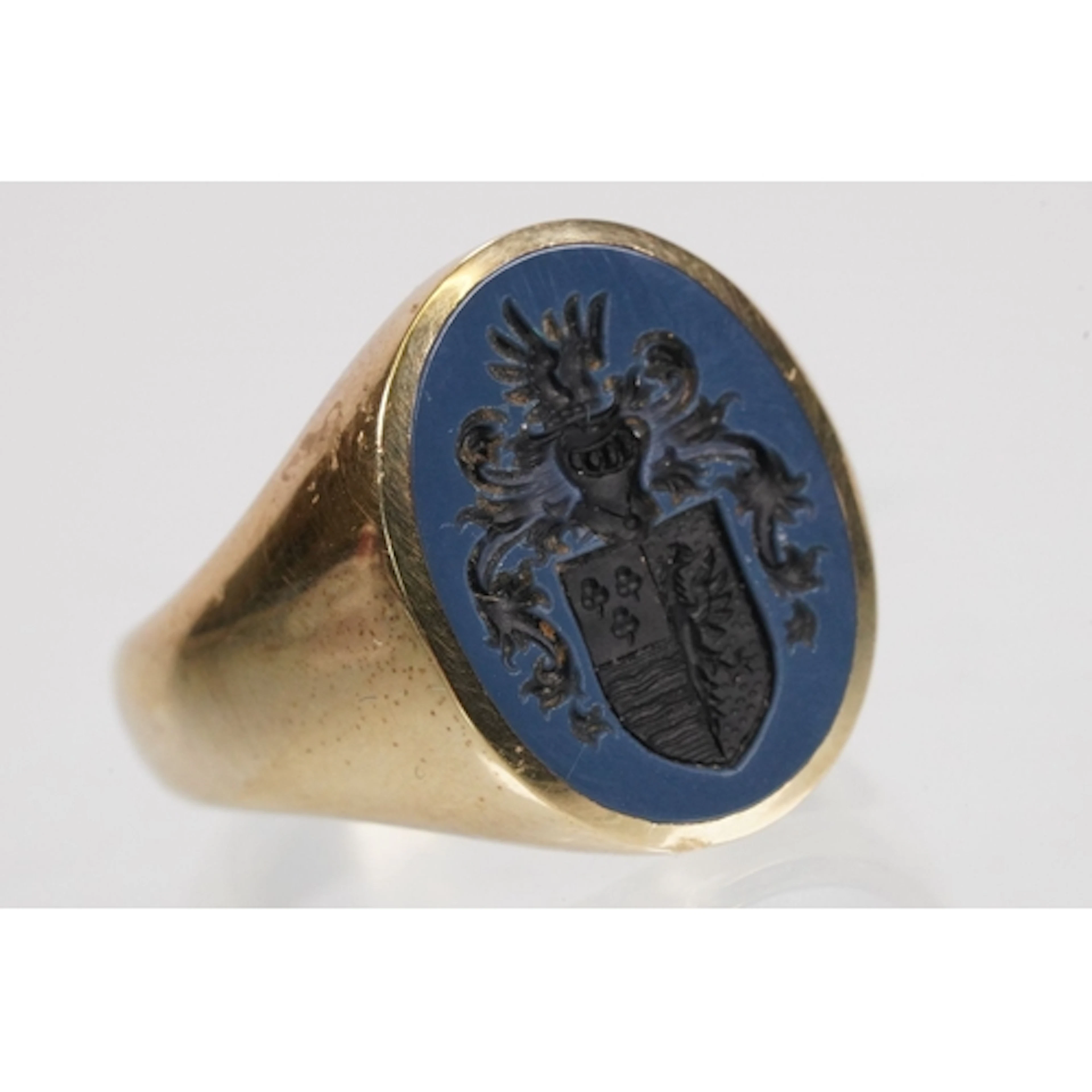 Large gentleman's yellow metal signet ring being set with a ...