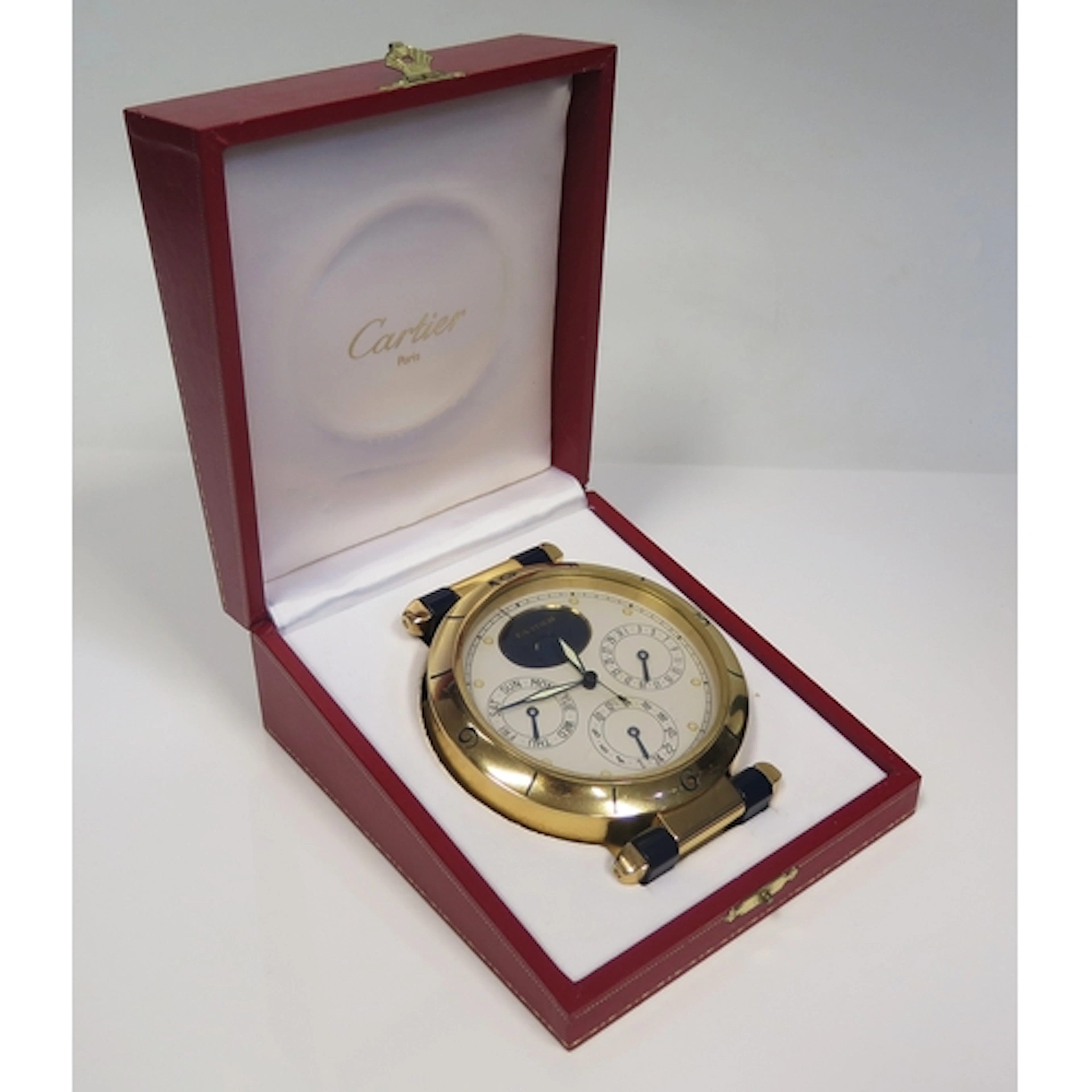 Cartier, a 'Pasha' desk timepiece, with 10.5cm dial having s...