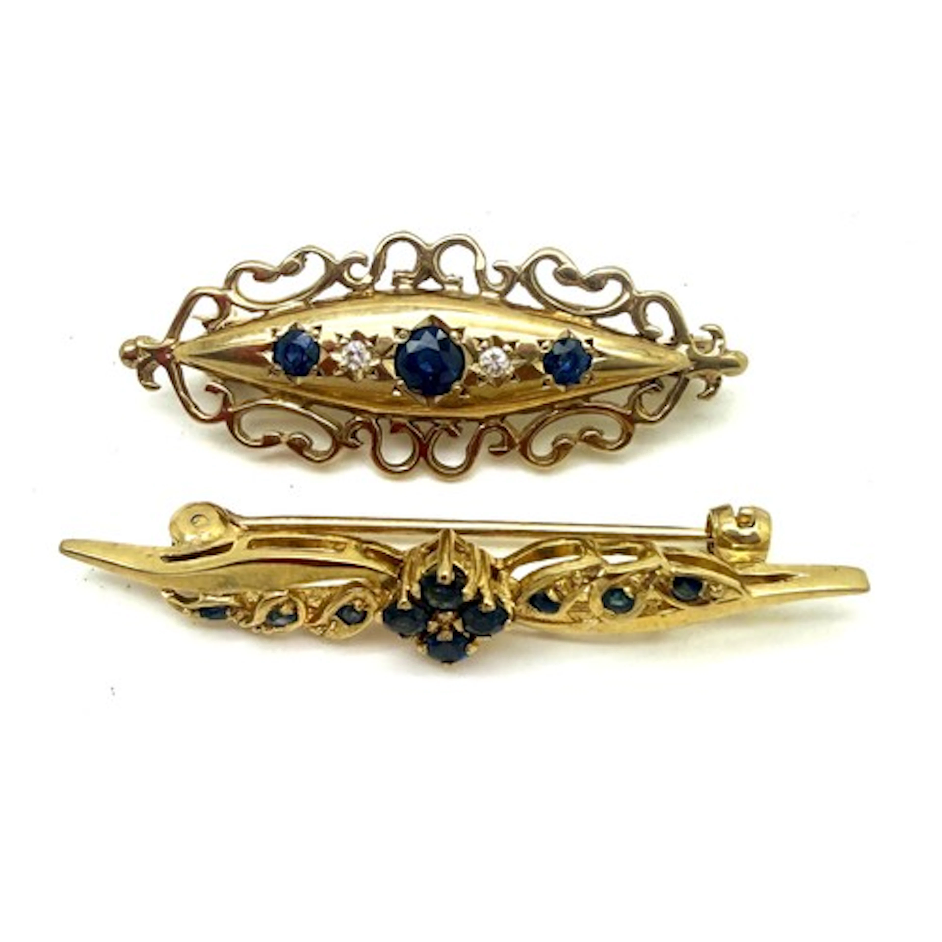 Two 9 carat gold bar brooches sets with sapphires and diamon...