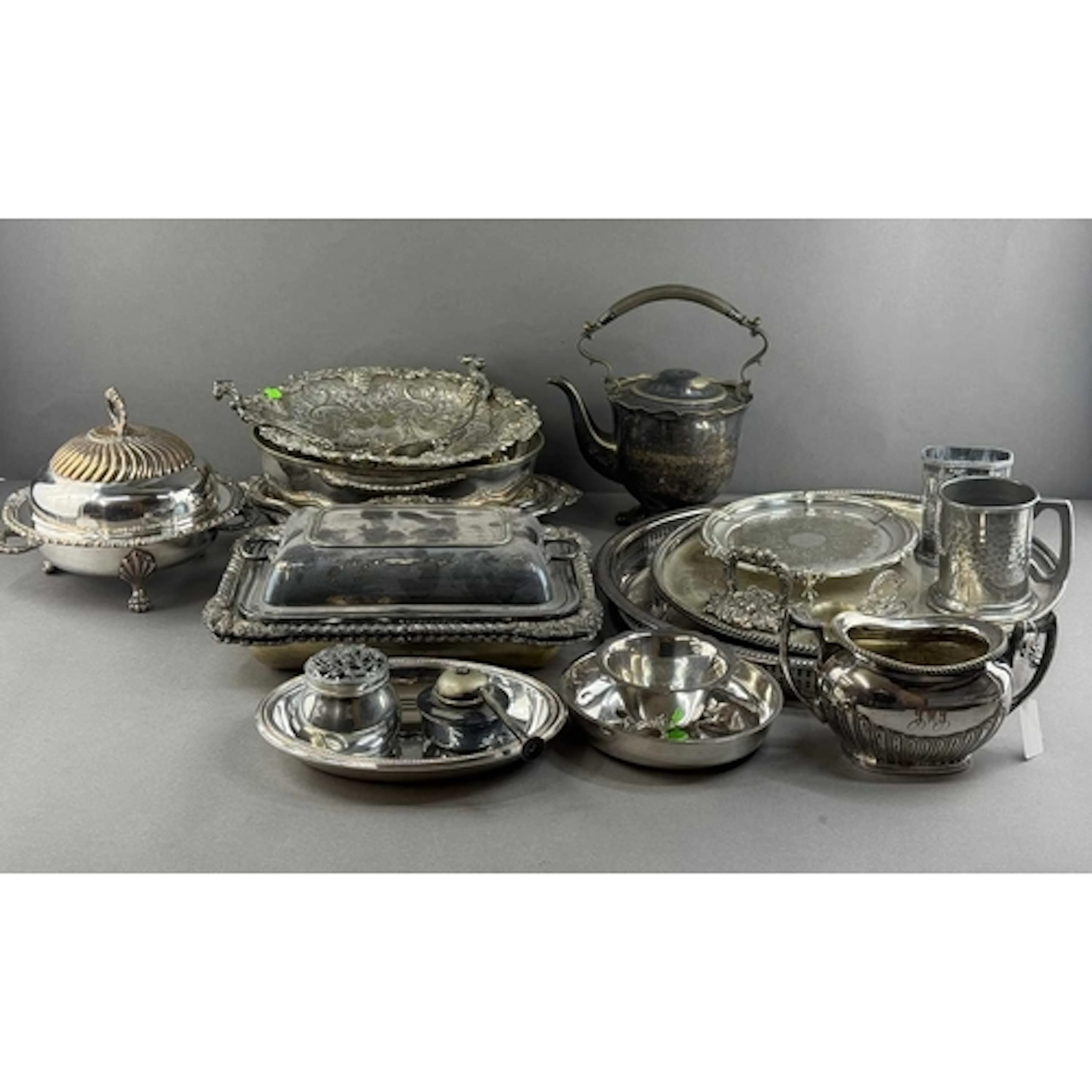Silver Plate: an ornate entree dish and lid, another plainer...