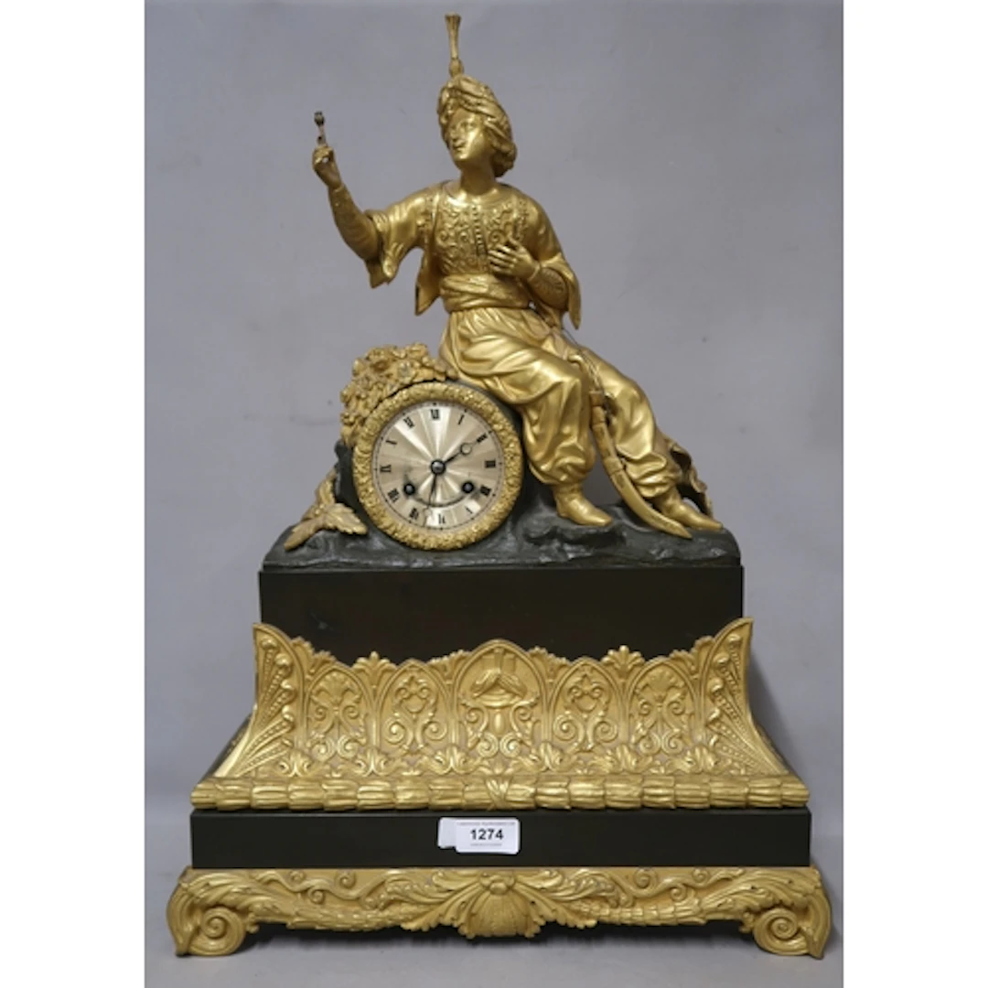 Early 19th Century French dark patinated and gilt bronze man...