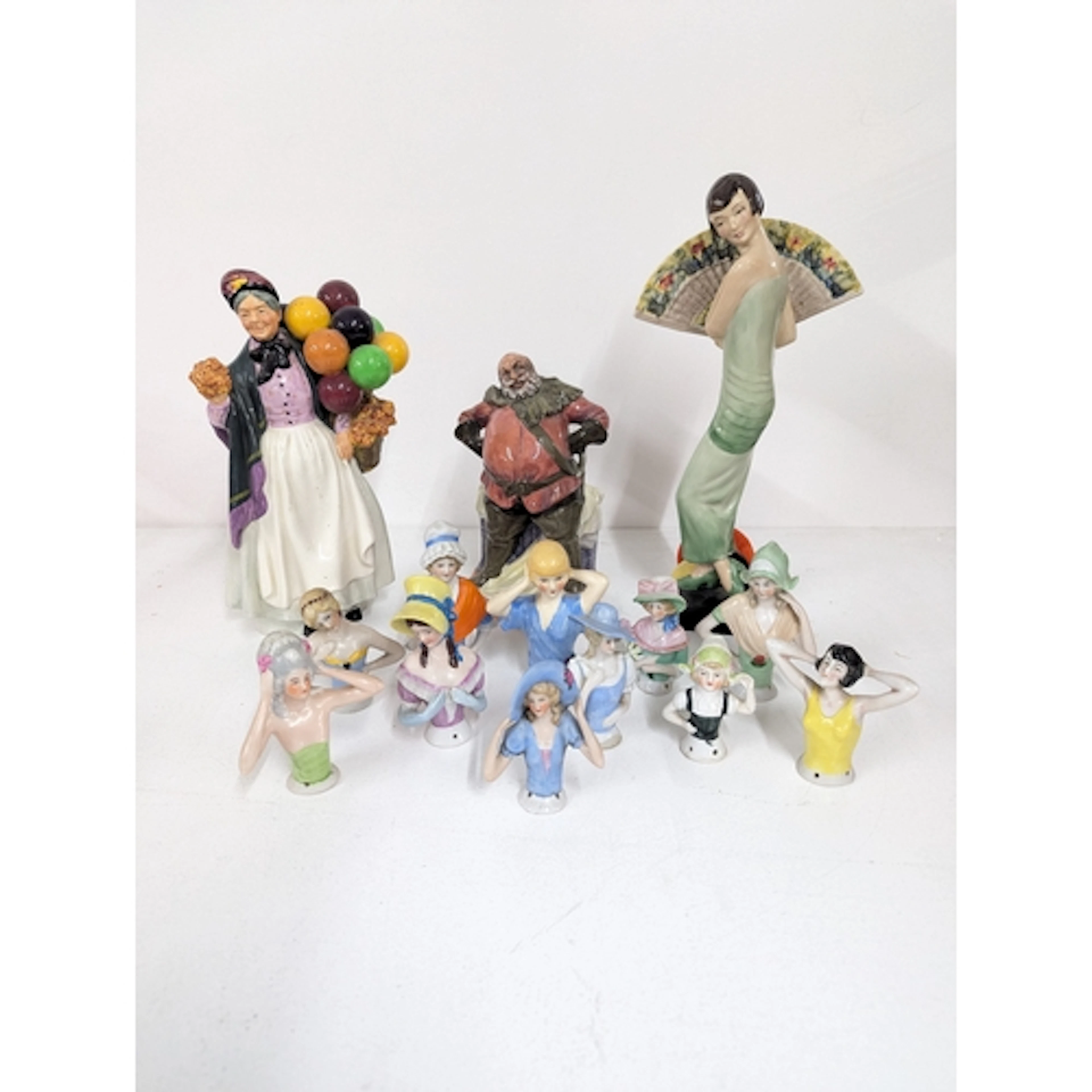 Figurines to include Royal Doulton Biddy Penny Farthing, Roy...