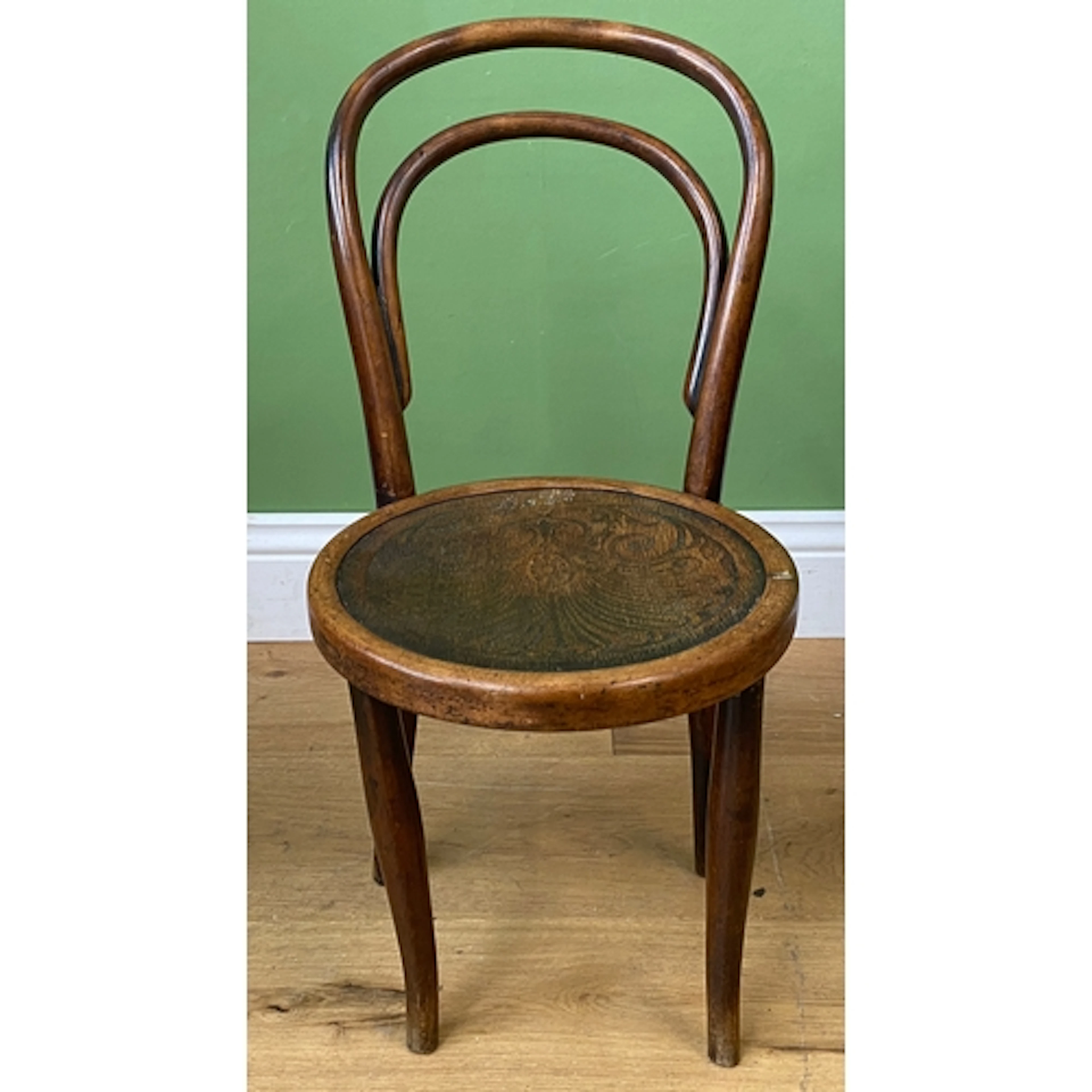 A child's Thonet style bentwood chair, the seat approx. 35cm...
