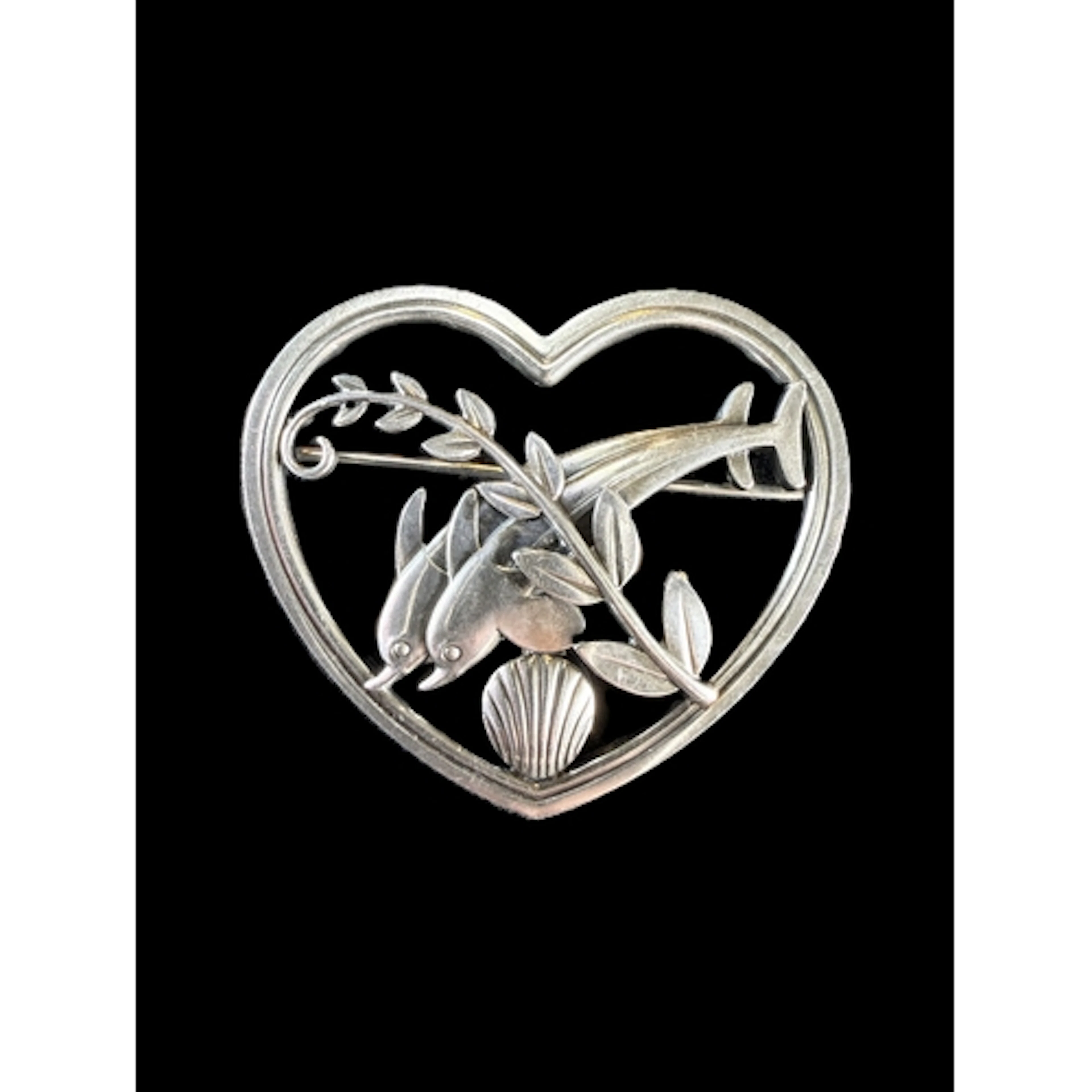 Georg Jensen: a silver openwork heart shaped brooch with a p...