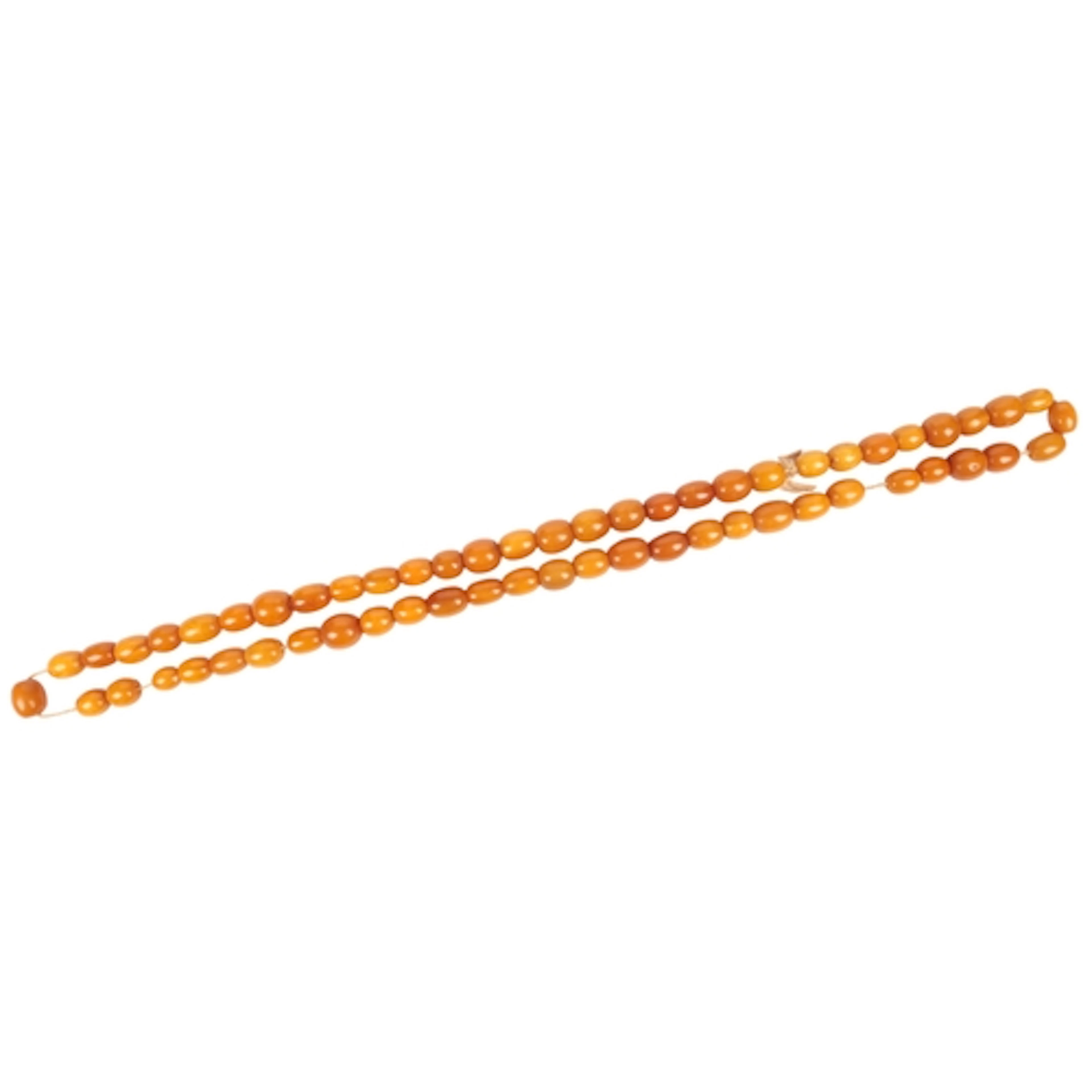 An amber bead necklace, composed of oval amber beads measuri...