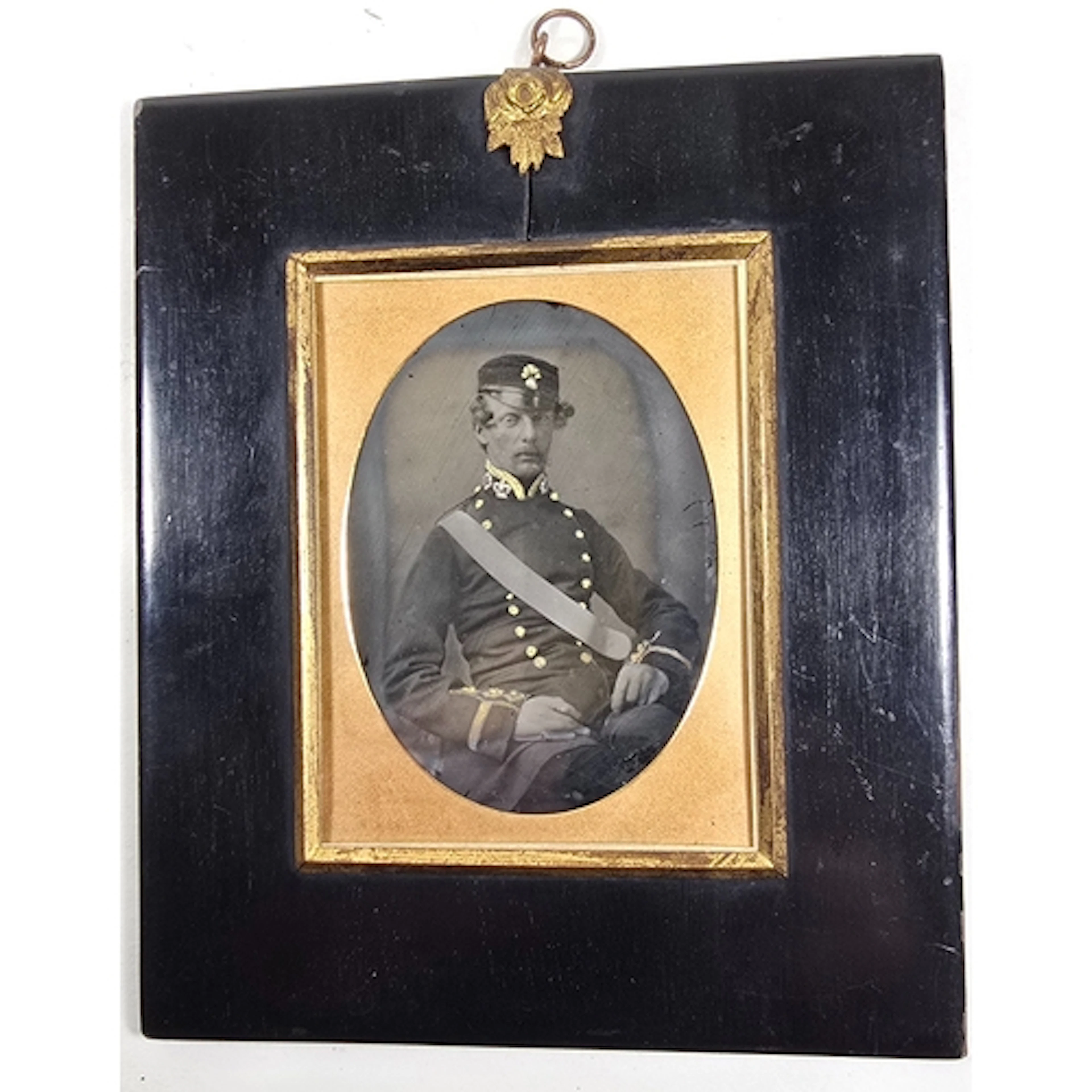 A Victorian 1/4 plate ambrotype of a seated captain of a Fus...