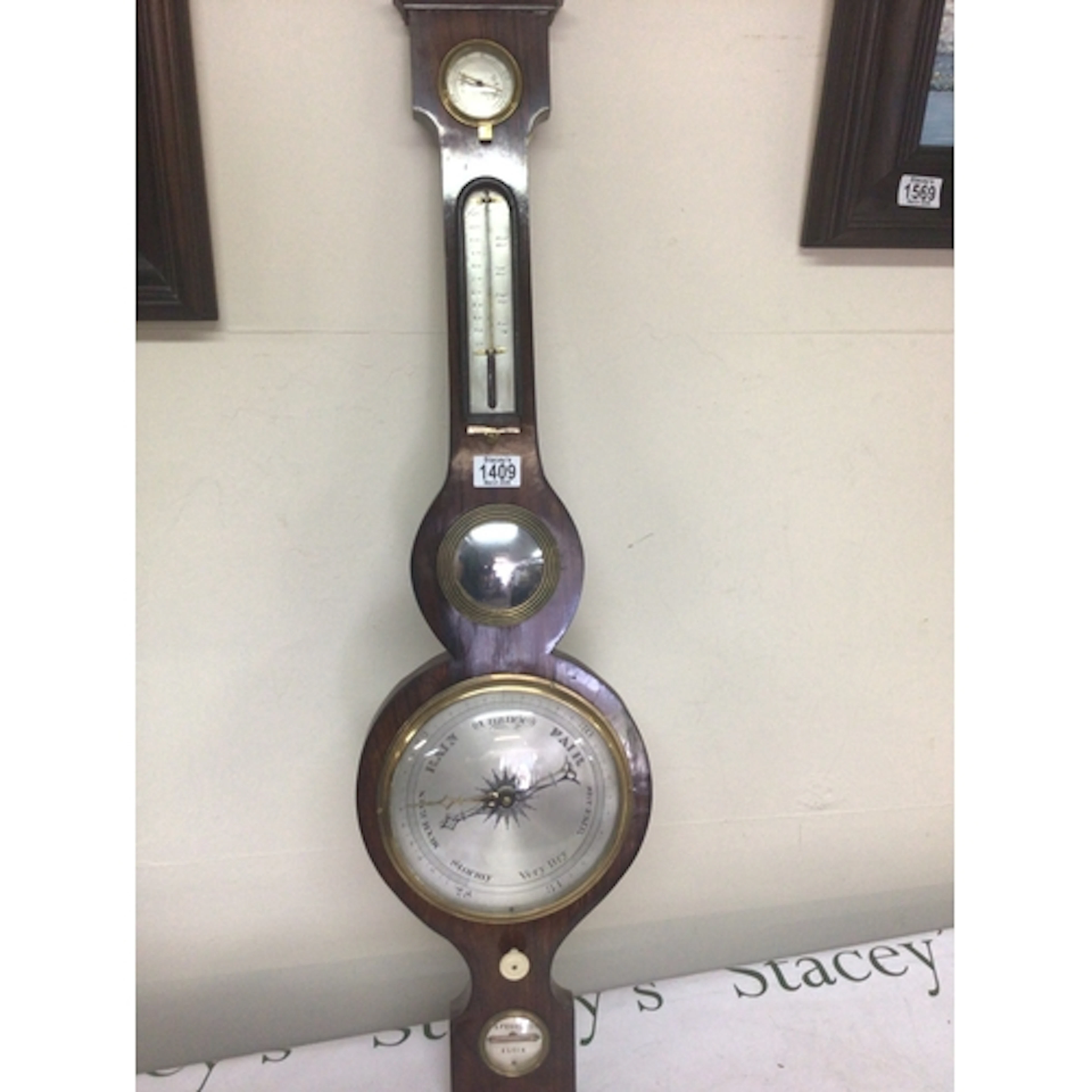 A Rosewood 19th century barometer with thermometer box maker...
