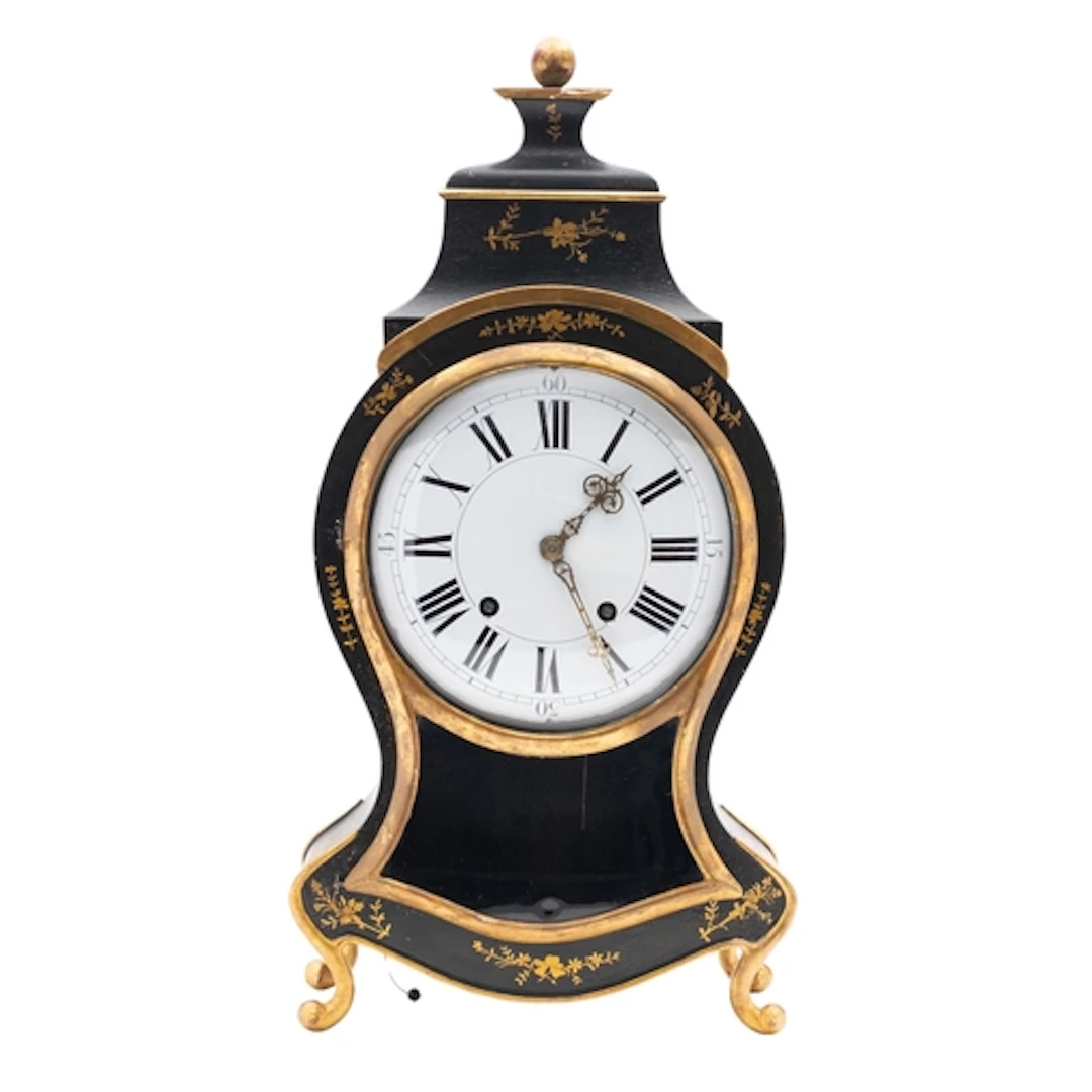 An unusual quarter striking bracket clock with bracket the e...
