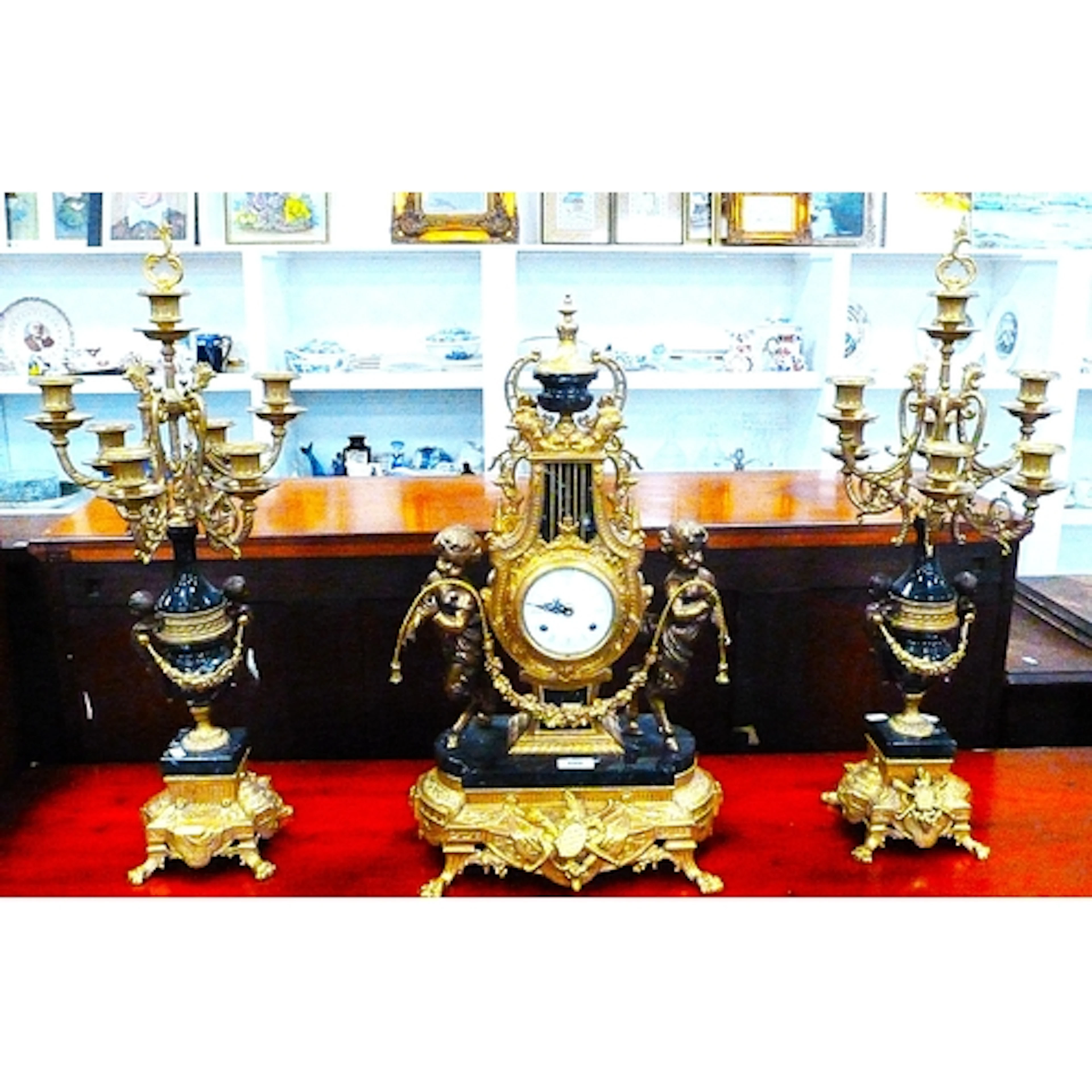 Large Reproduction Rococo style three piece gilt brass clock...