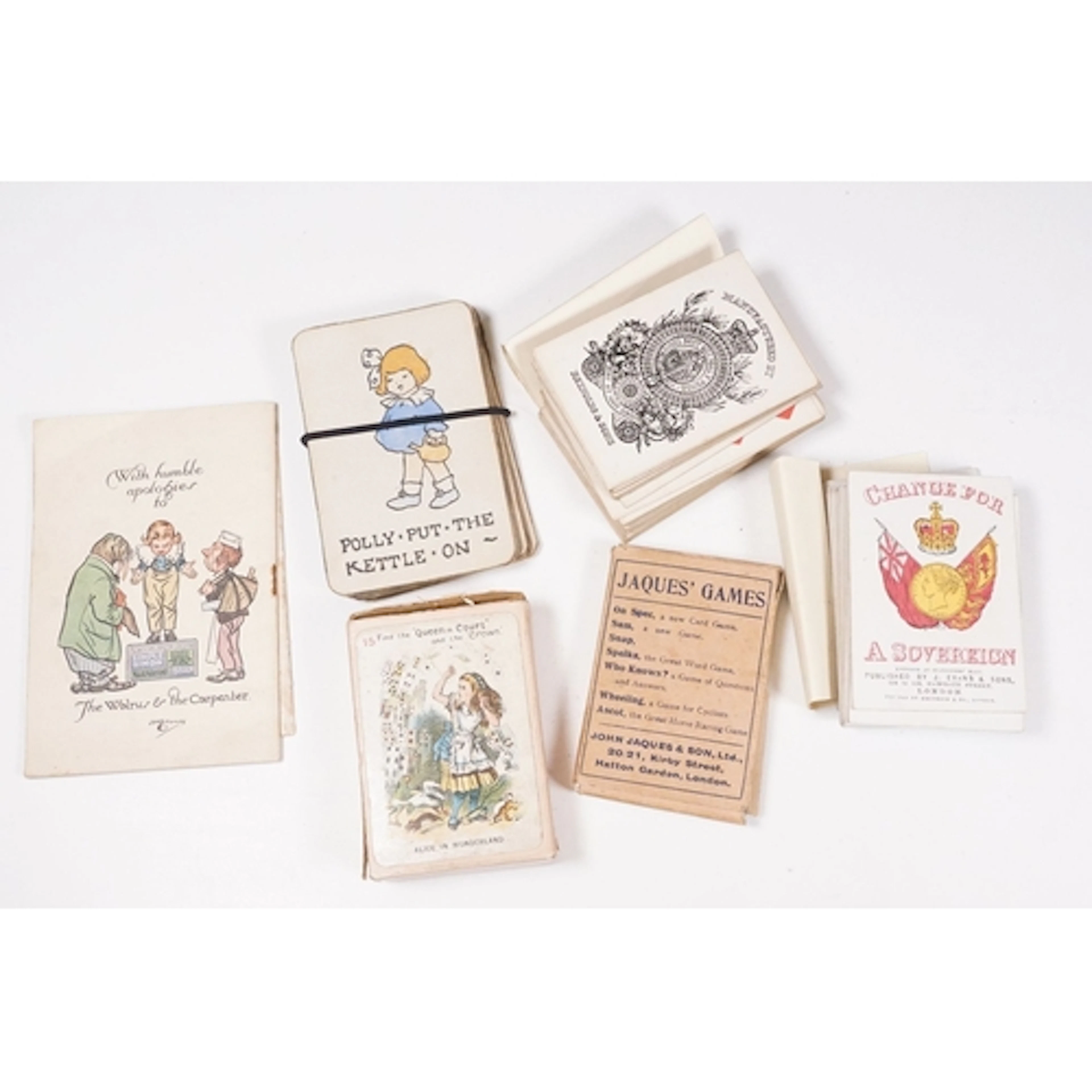 Small collection of books and playing cards to include Simpl...