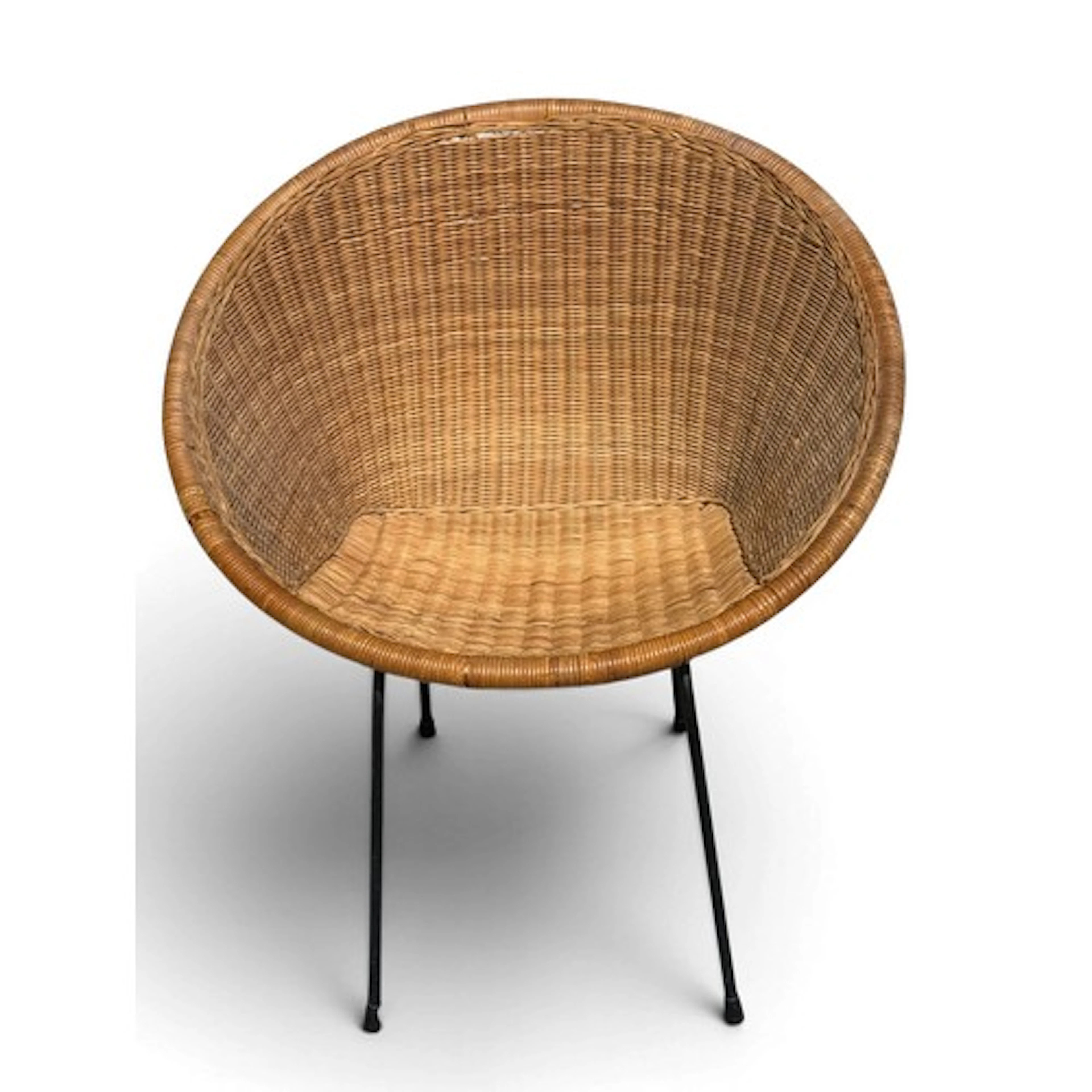 A mid 20th century wicker and iron chair. 78 h x 77cm w.
