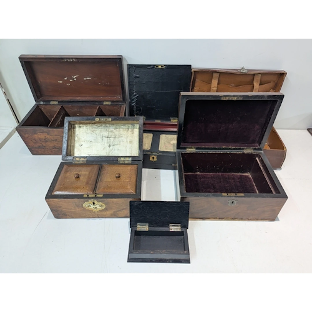 Four wooden storage boxes to include a tea caddy of sarcopha...