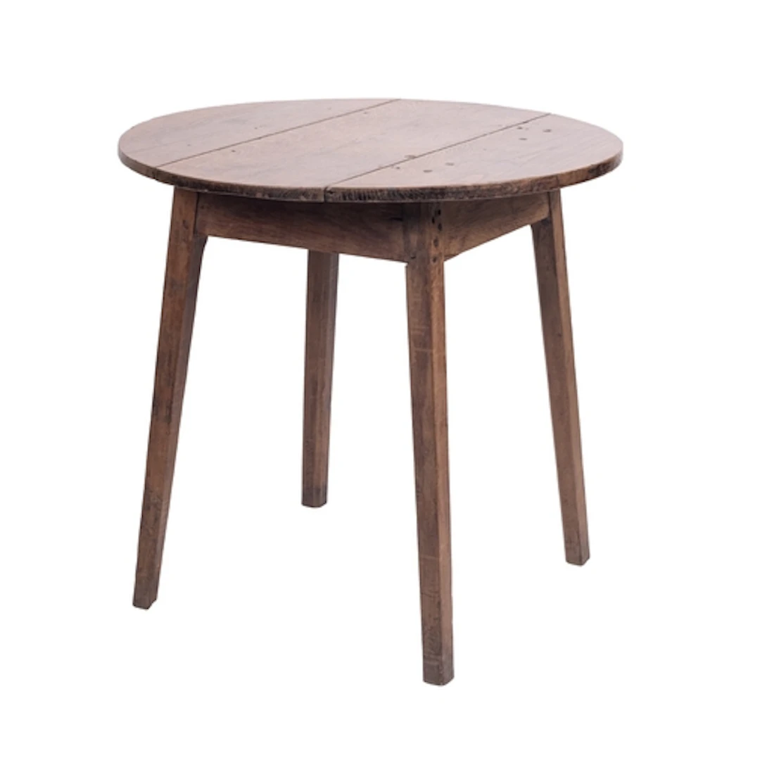 A circular oak table, 19th century; of rustic character and ...